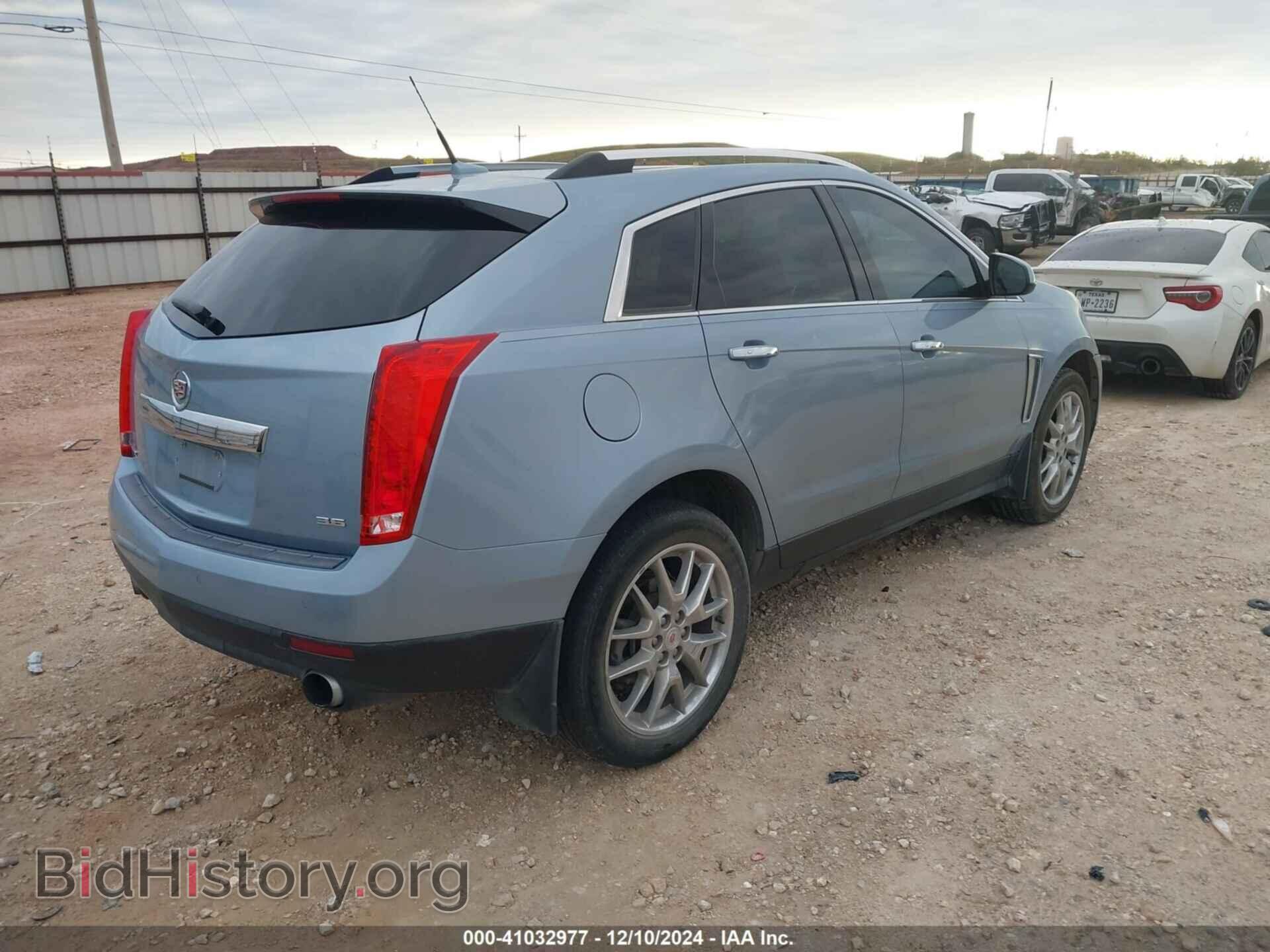 2014 CADILLAC SRX - VIN: 3GYFNDE35ES558510 - Фото 4
