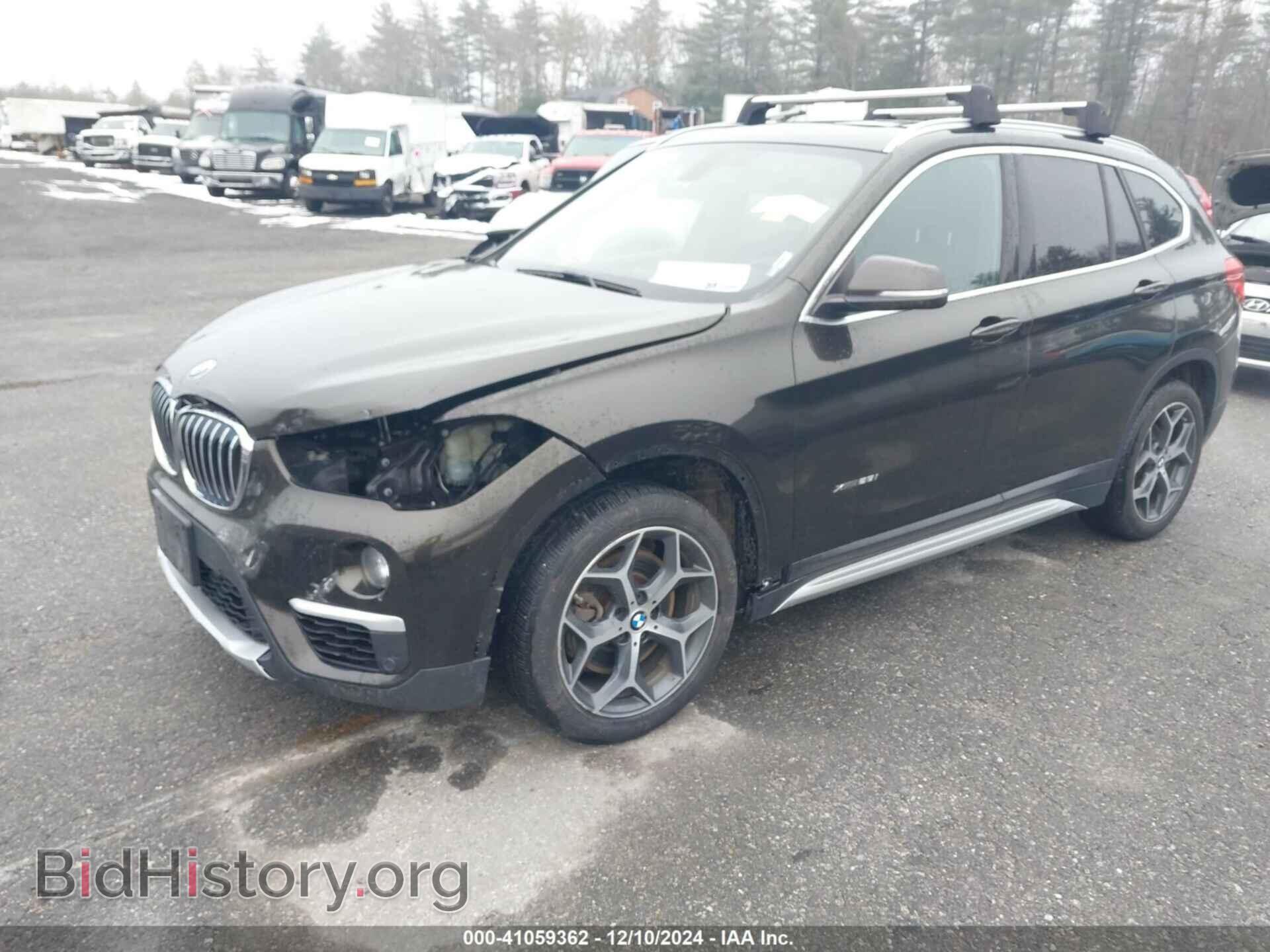 2017 BMW X1 - VIN: WBXHT3C32H5F85637 - Фото 2