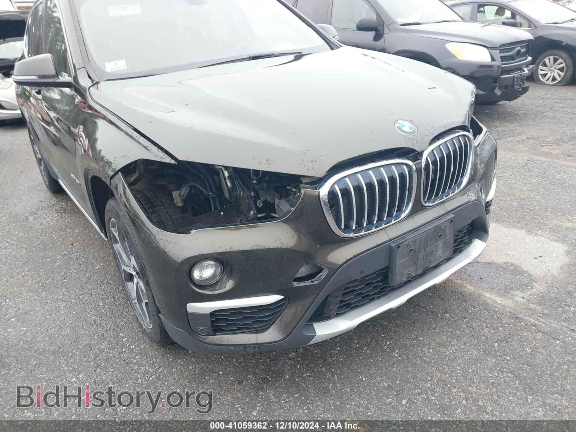 2017 BMW X1 - VIN: WBXHT3C32H5F85637 - Фото 17