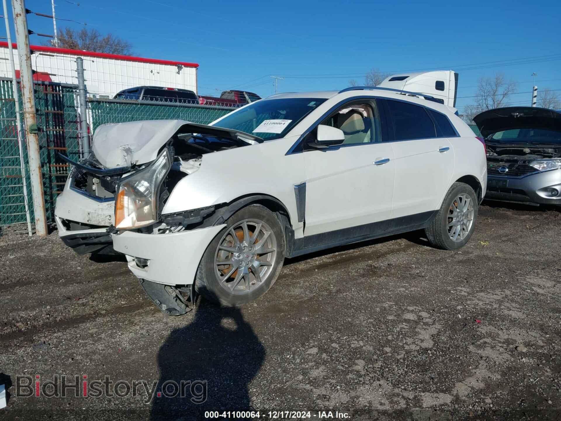 2014 CADILLAC SRX - VIN: 3GYFNFE35ES516382 - Фото 2
