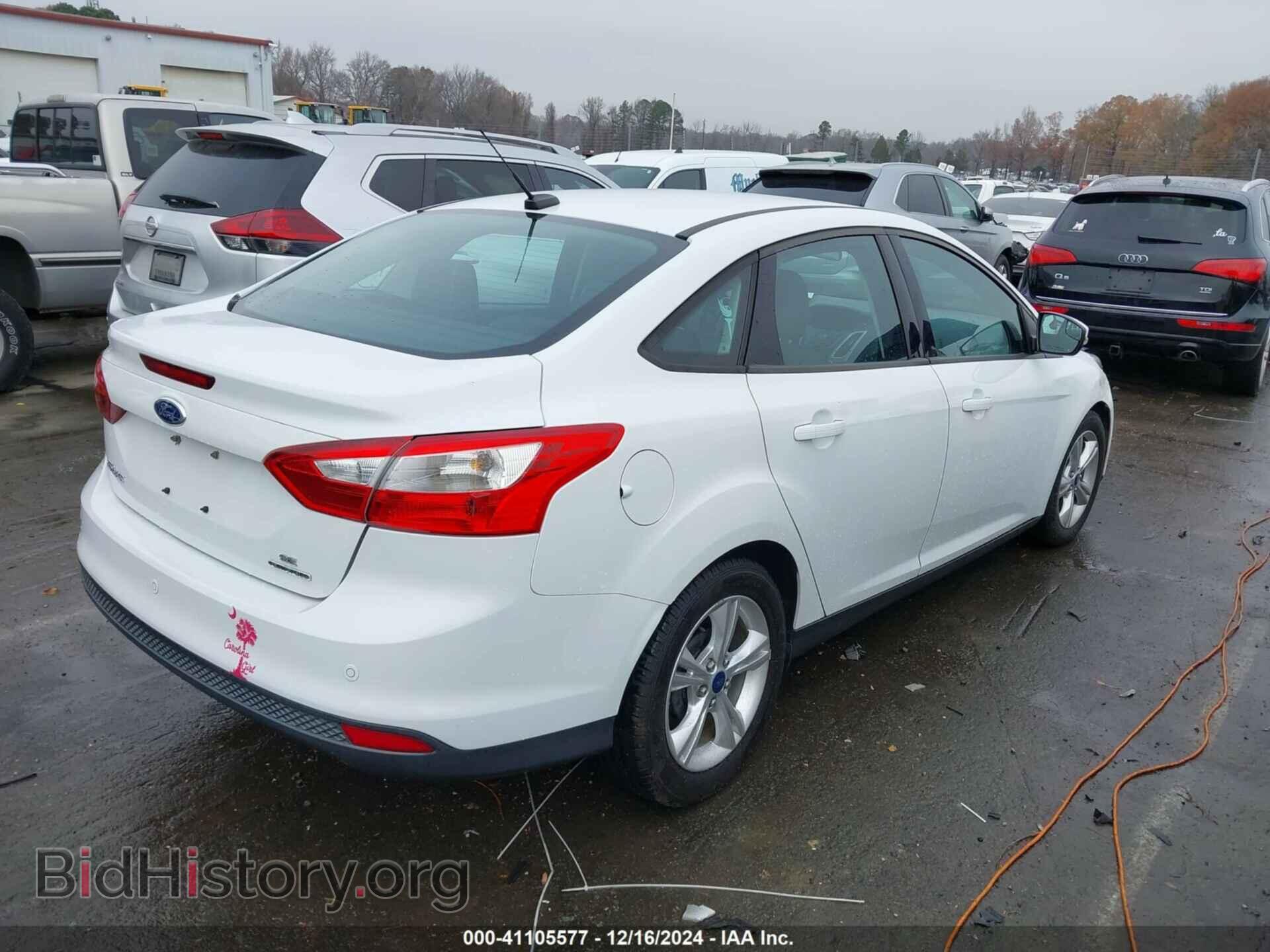 2014 FORD FOCUS - VIN: 1FADP3F21EL107075 - Photo 4