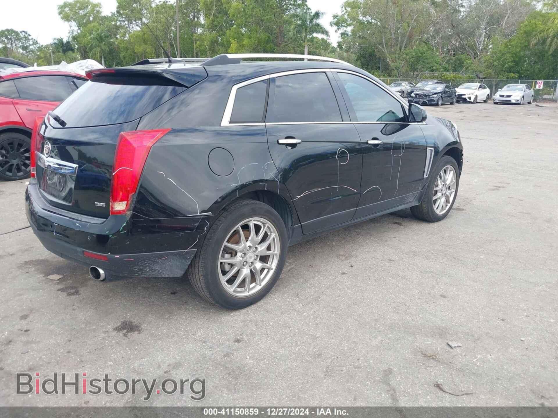 2014 CADILLAC SRX - VIN: 3GYFNDE33ES681741 - Фото 4