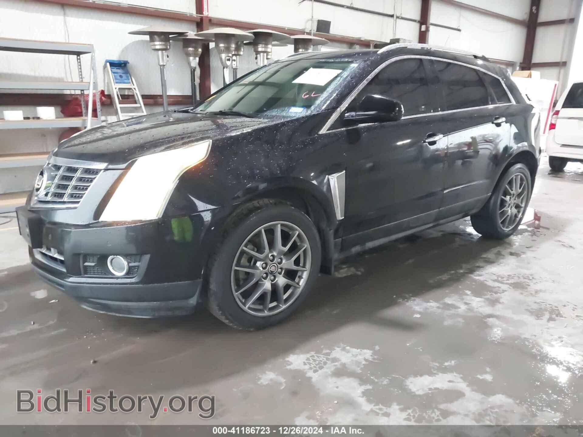 2016 CADILLAC SRX - VIN: 3GYFNDE35GS566013 - Фото 2