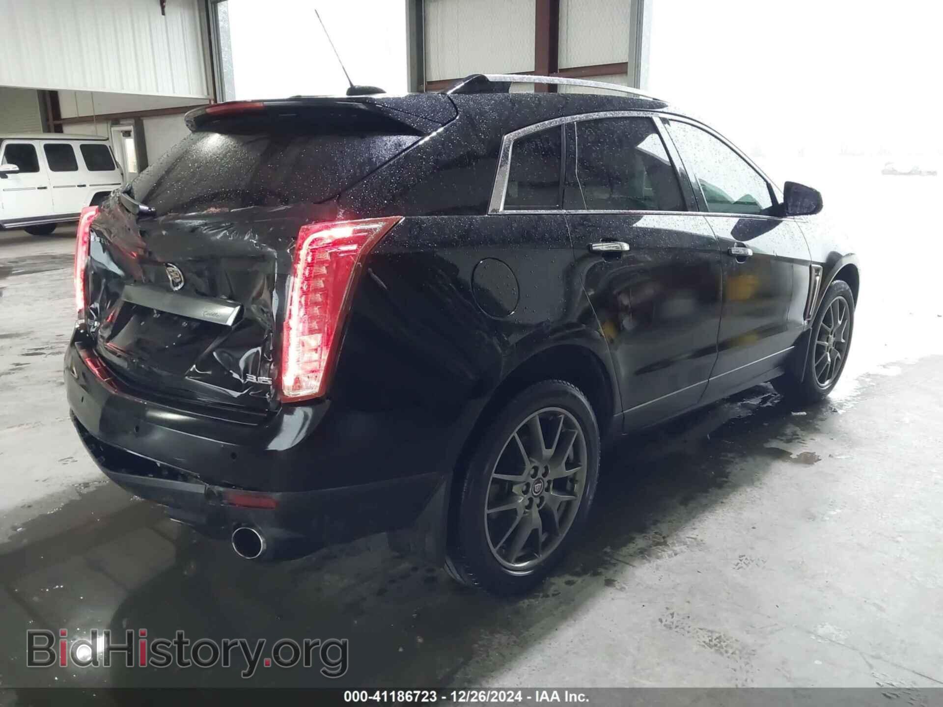 2016 CADILLAC SRX - VIN: 3GYFNDE35GS566013 - Фото 4