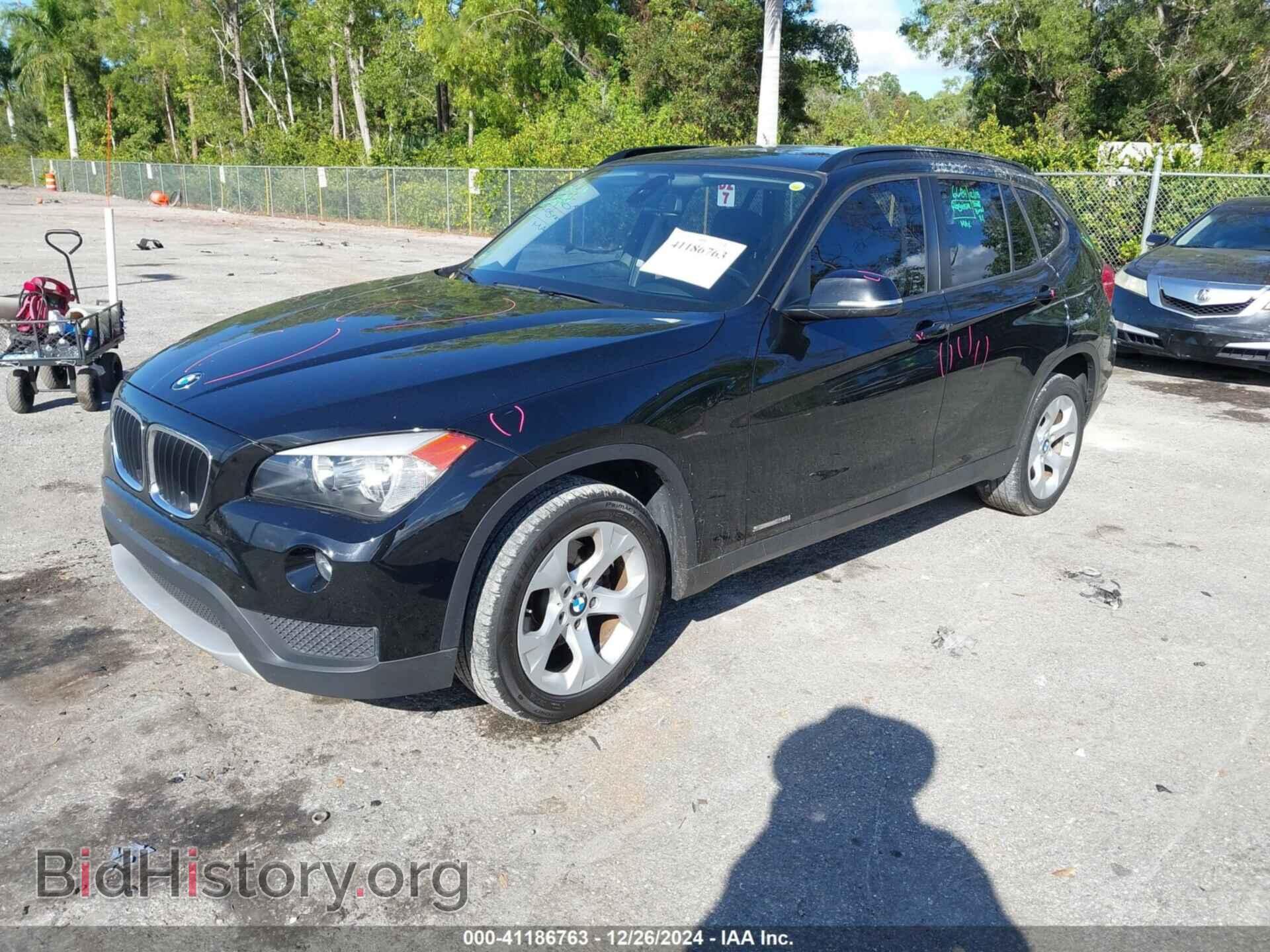 2014 BMW X1 - VIN: WBAVM1C5XEVW48718 - Фото 2