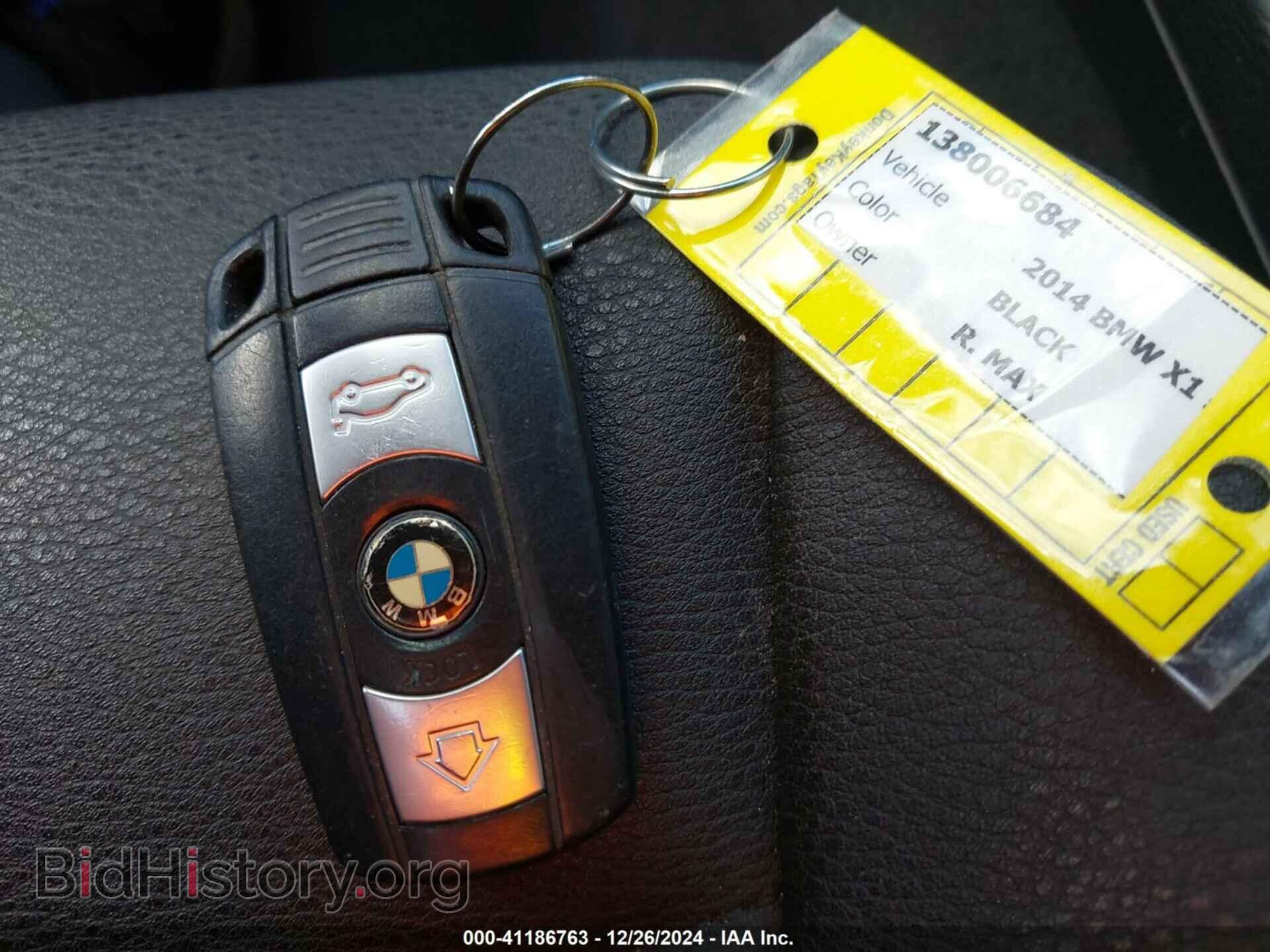 2014 BMW X1 - VIN: WBAVM1C5XEVW48718 - Фото 11