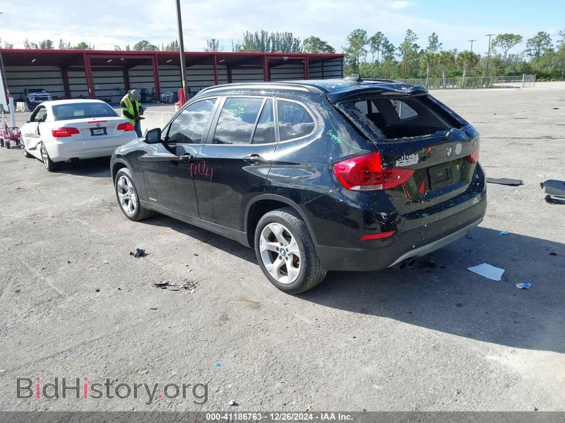 2014 BMW X1 - VIN: WBAVM1C5XEVW48718 - Фото 3