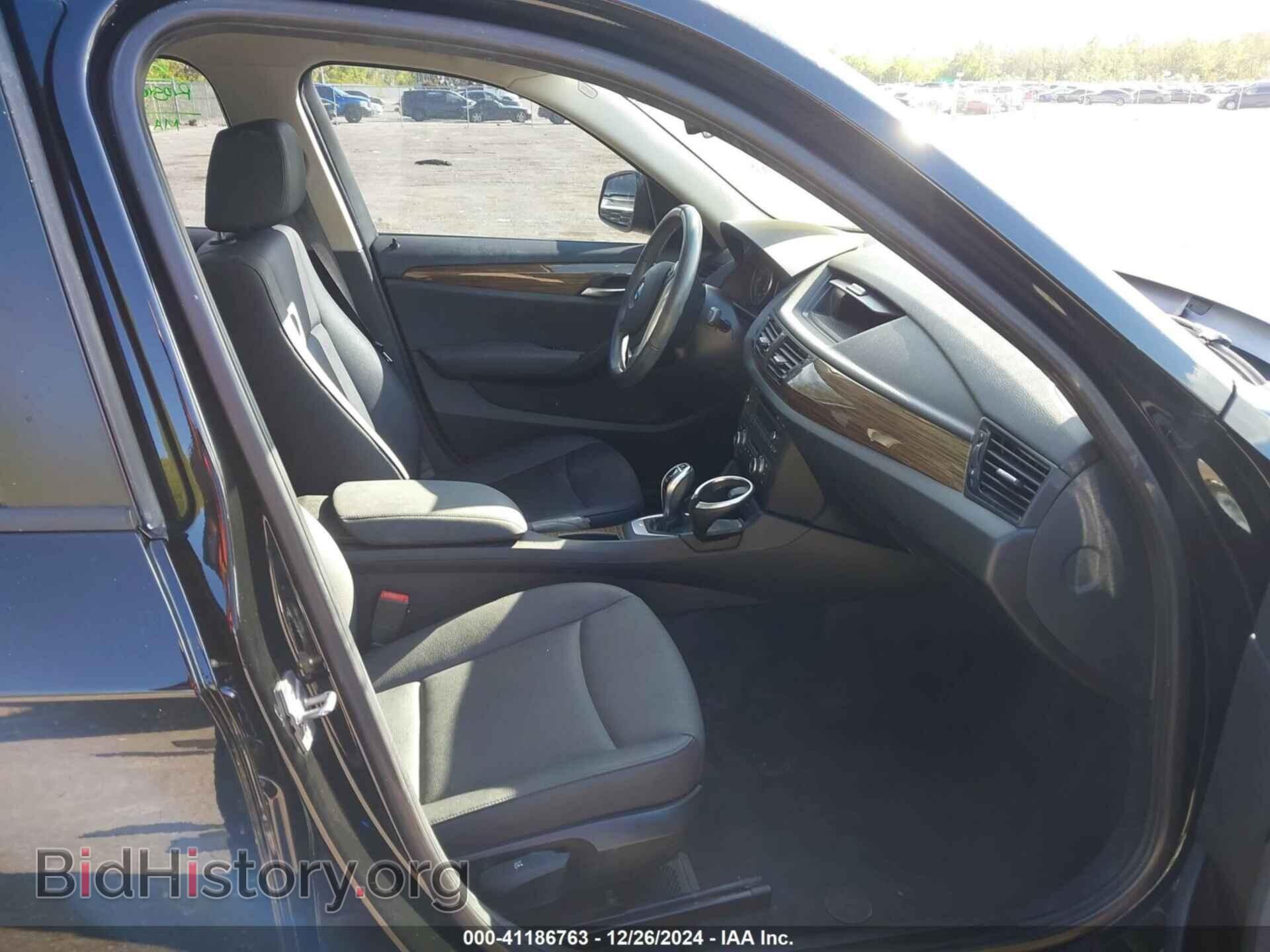 2014 BMW X1 - VIN: WBAVM1C5XEVW48718 - Фото 5