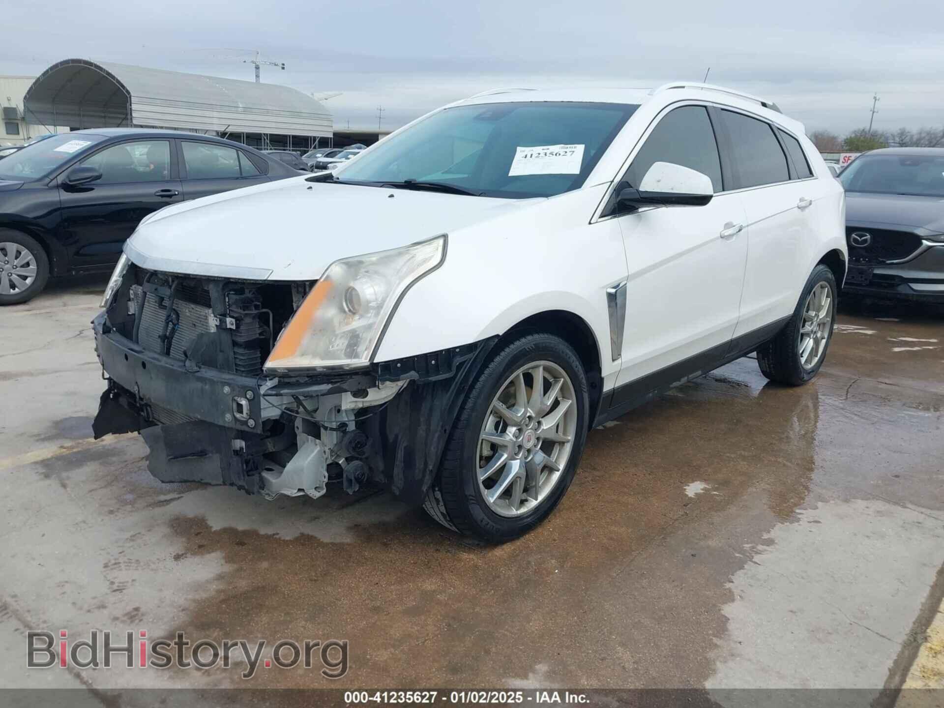 2014 CADILLAC SRX - VIN: 3GYFNDE36ES545572 - Фото 2