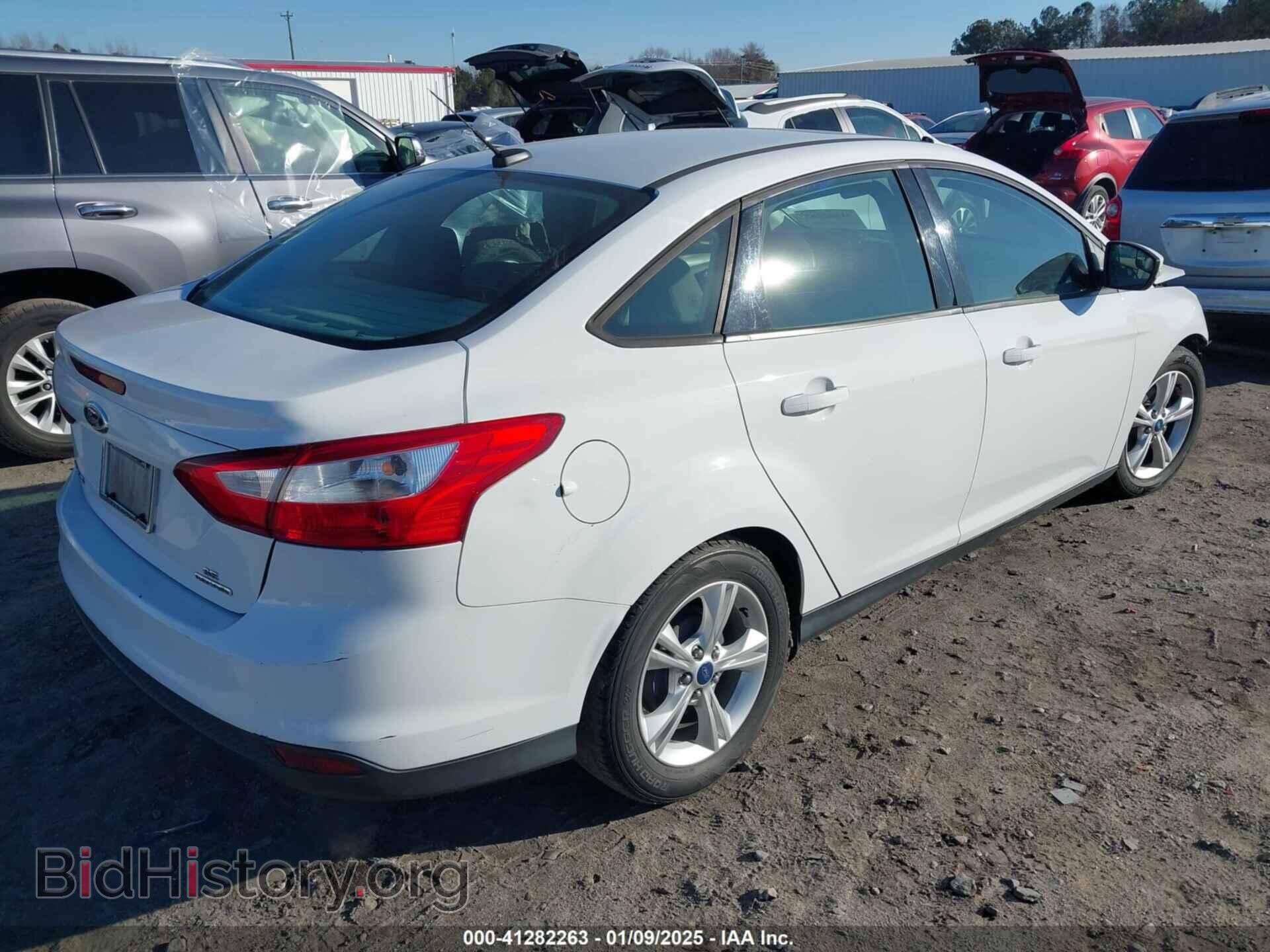 2014 FORD FOCUS - VIN: 1FADP3F27EL215930 - Photo 4