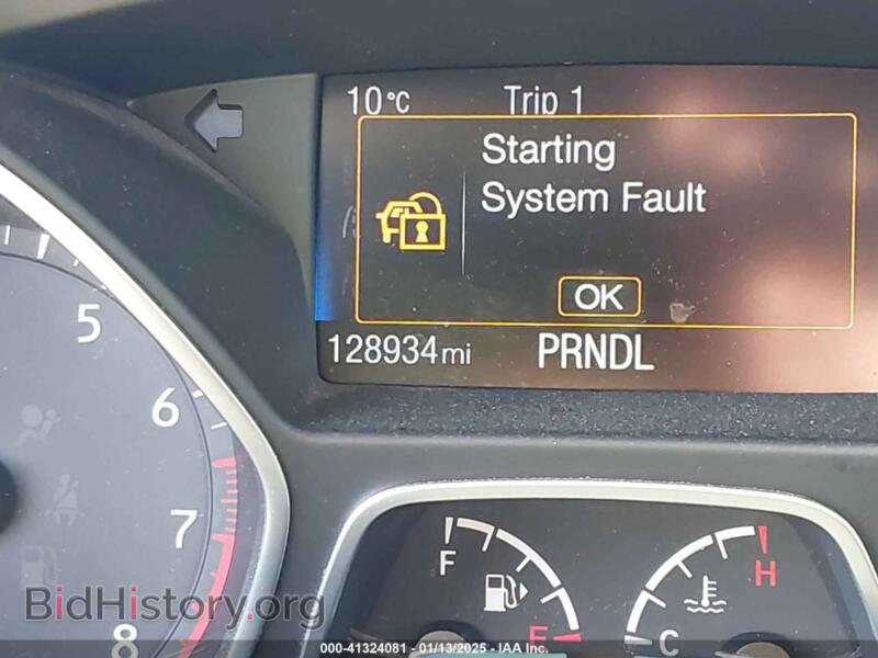 2016 Ford FOCUS (VIN 1FADP3F27GL385112) — фото 7 из 11