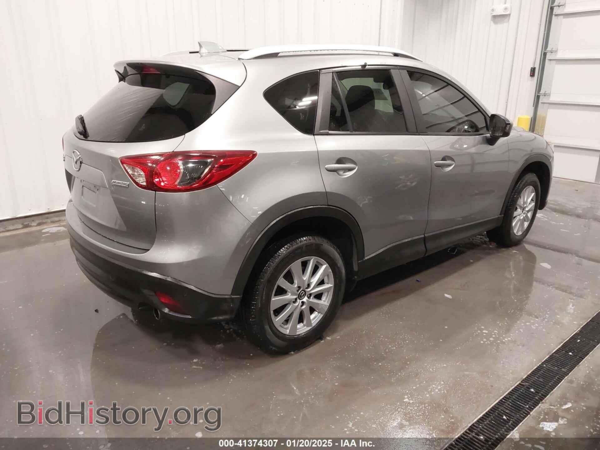 2014 MAZDA CX-5 - VIN: JM3KE2CY3E0409499 - Фото 4