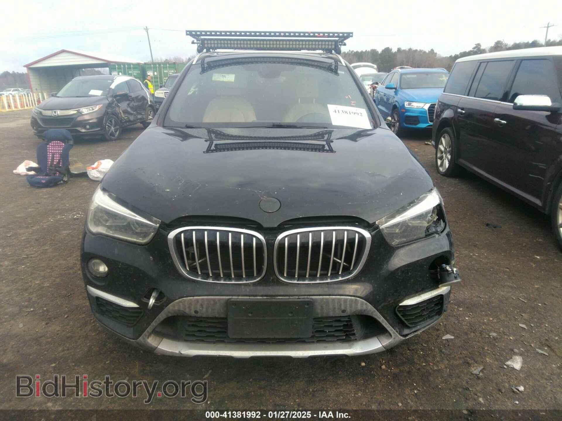 2017 BMW X1 - VIN: WBXHT3C36H5F78559 - Фото 11