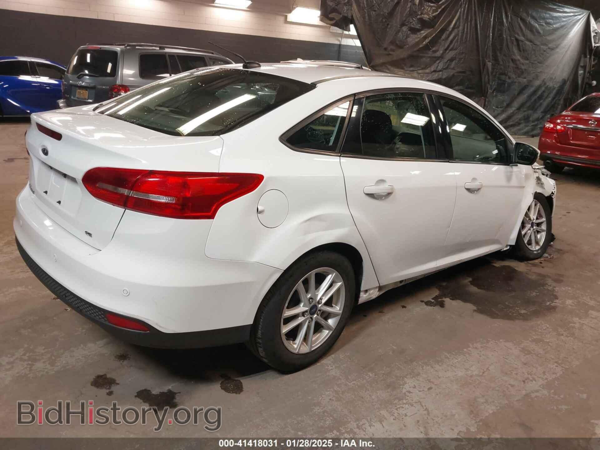 2016 FORD FOCUS - VIN: 1FADP3F25GL401016 - Photo 4