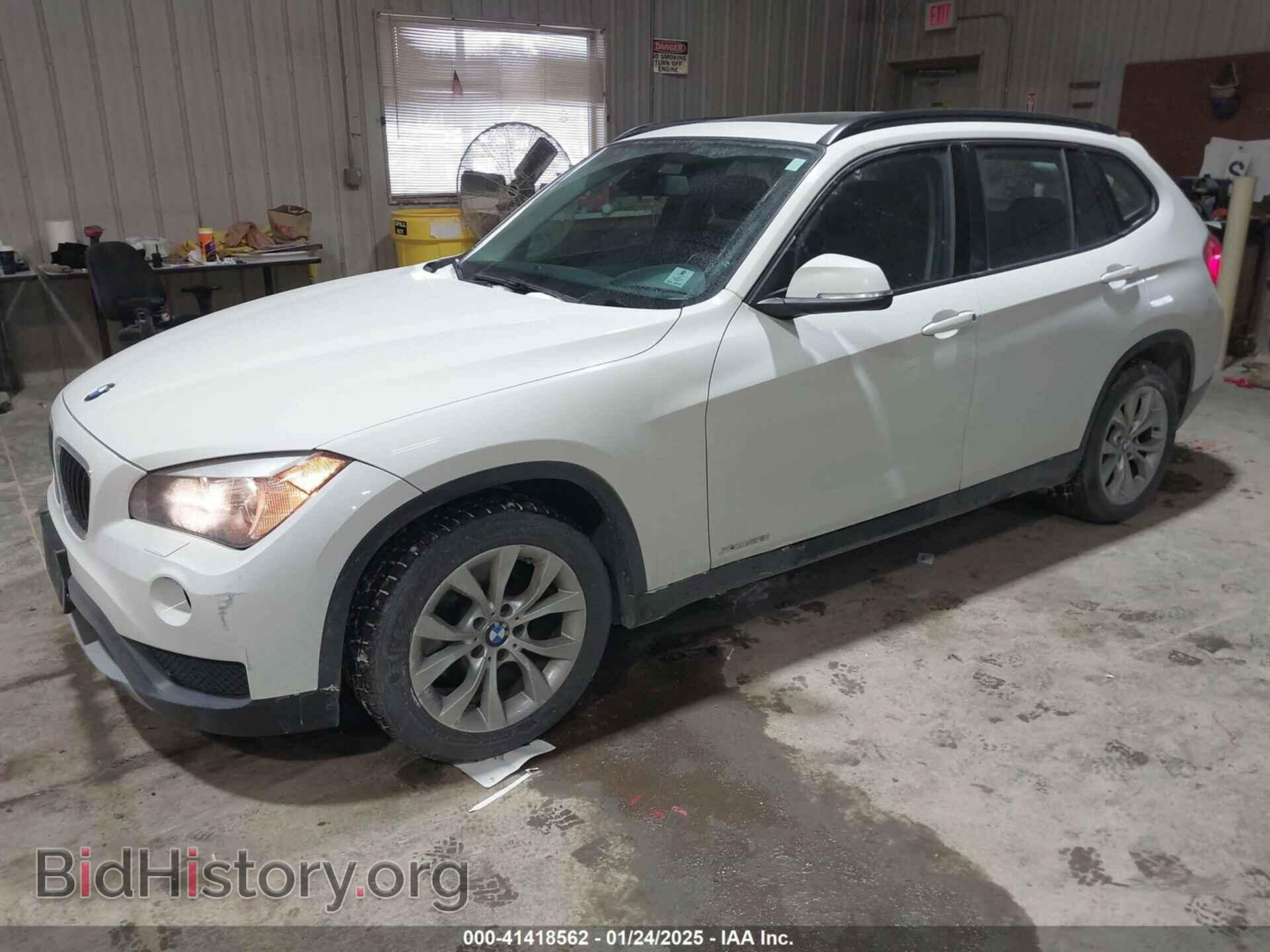 2014 BMW X1 - VIN: WBAVL1C54EVY10040 - Фото 2