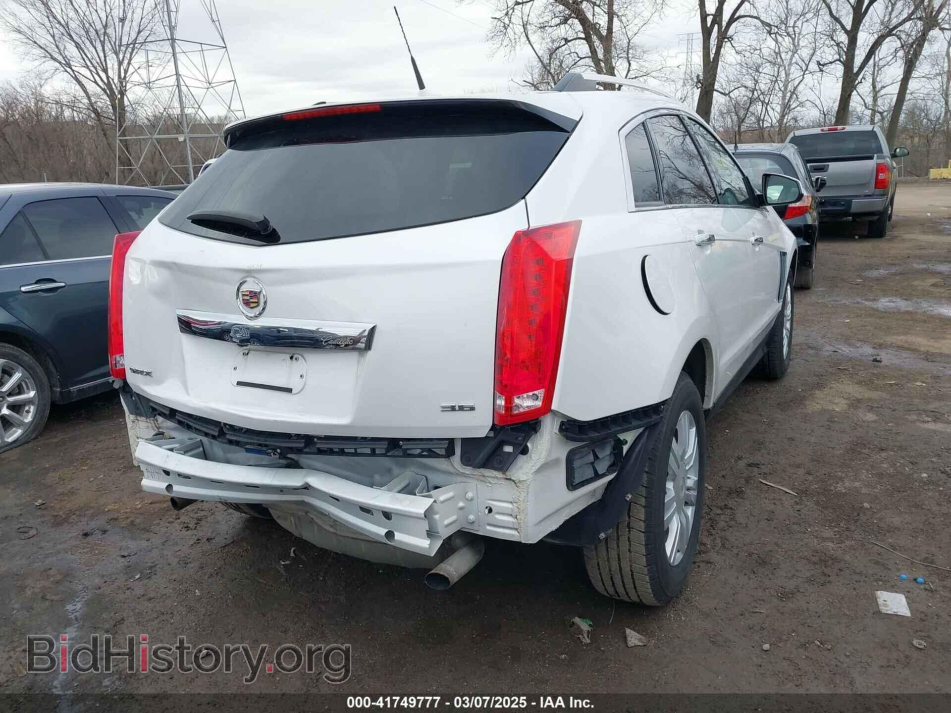 2014 CADILLAC SRX - VIN: 3GYFNBE32ES586866 - Фото 4