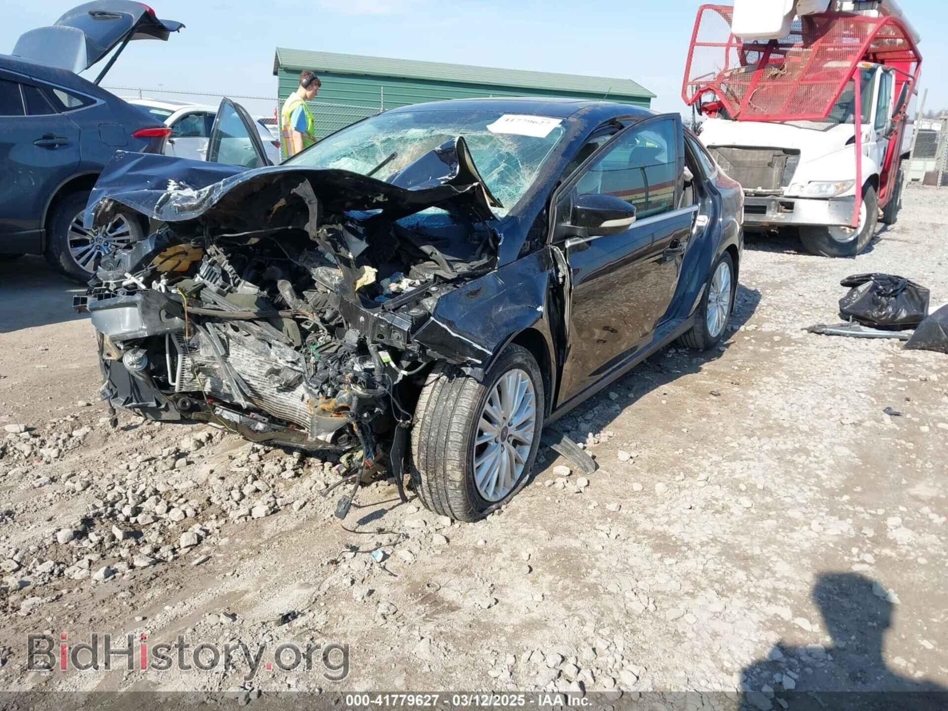 2016 FORD FOCUS - VIN: 1FADP3J29GL229483 - Фото 2