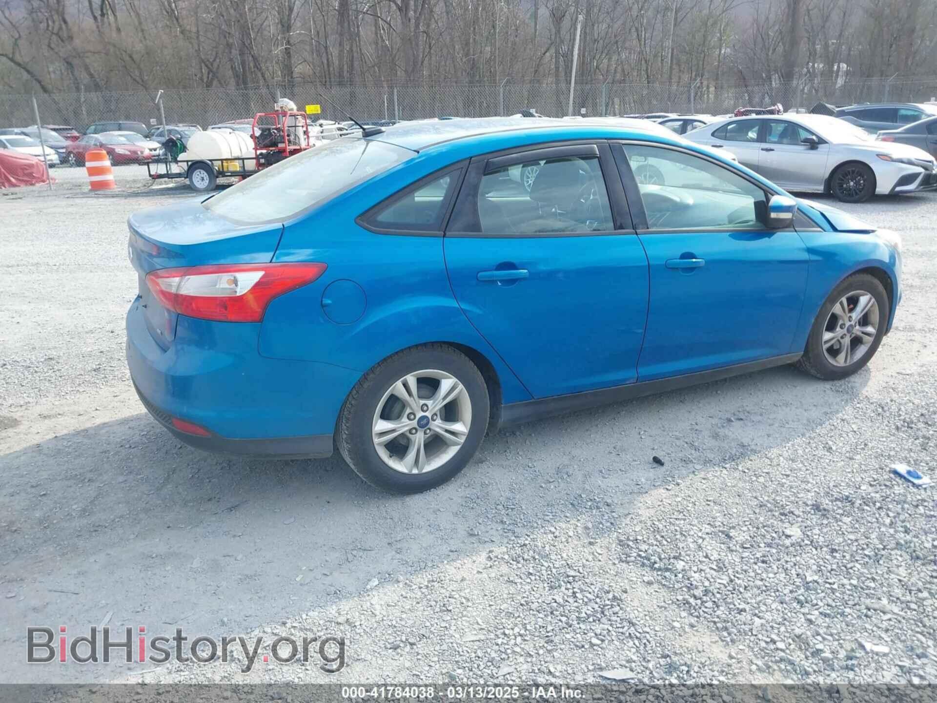 2014 FORD FOCUS - VIN: 1FADP3F22EL104606 - Photo 4