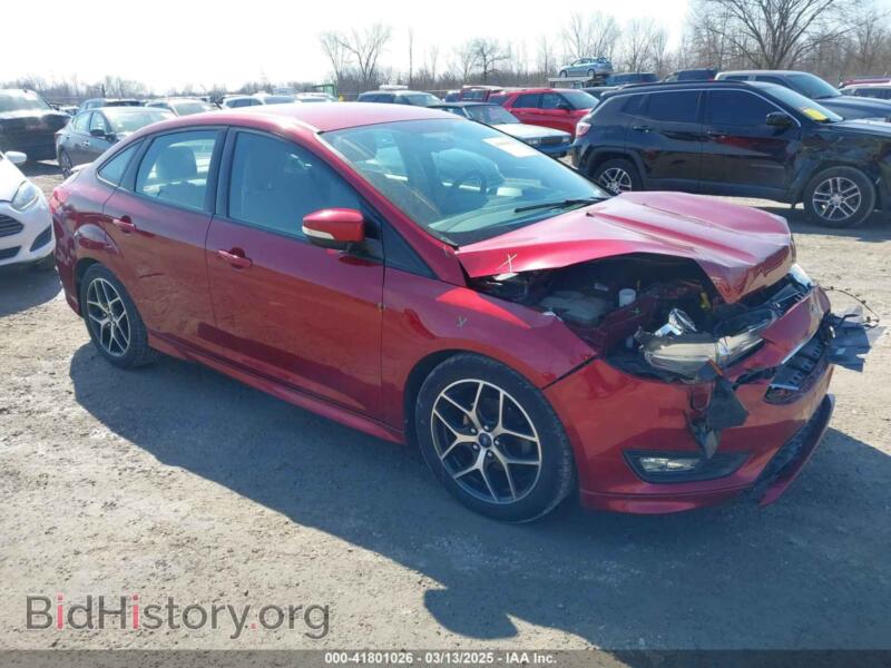 2015 Ford FOCUS SE (VIN 1FADP3F25FL273973) — photo 1 of 11, IAAI, damage: front end