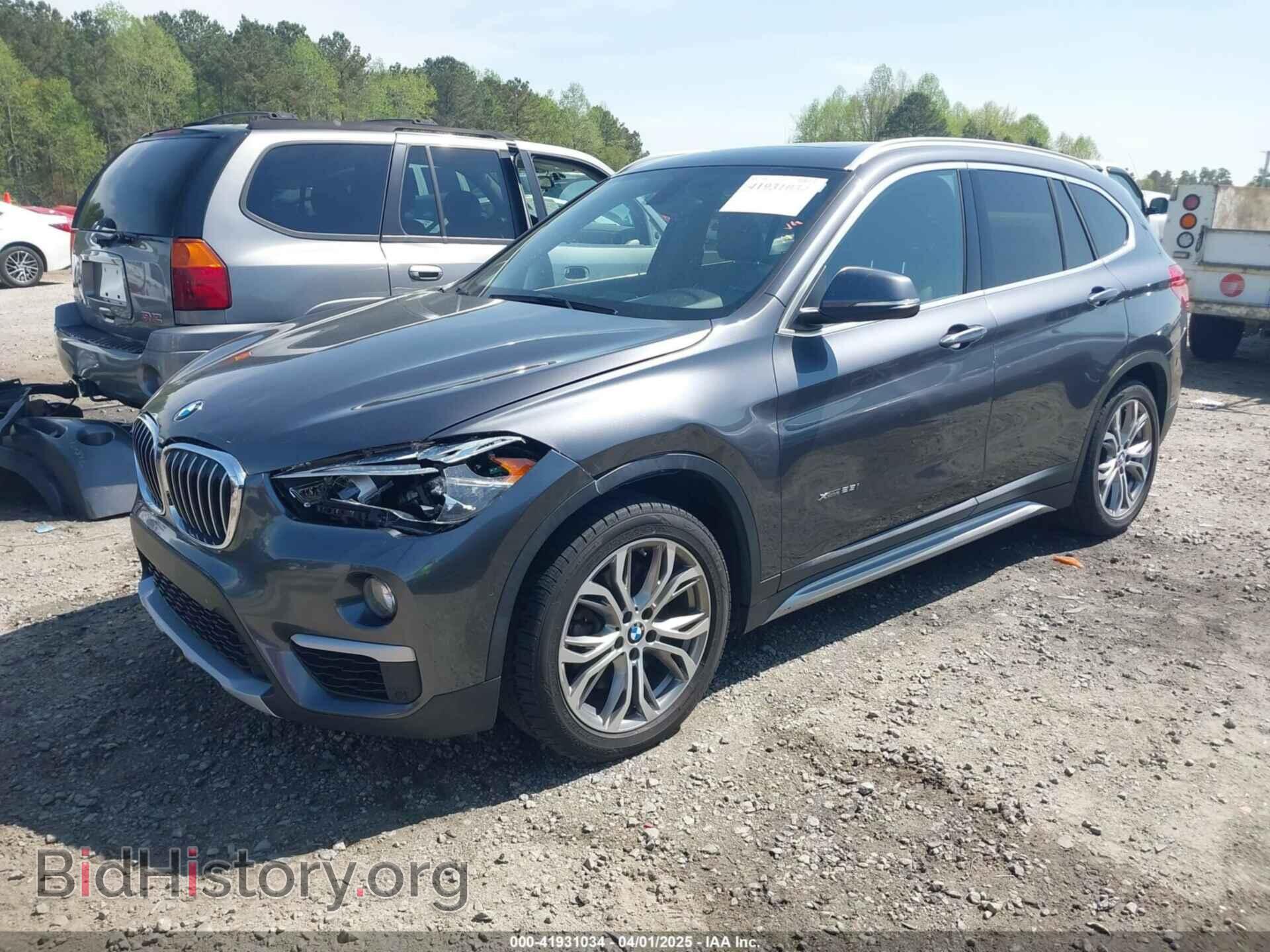 2017 BMW X1 - VIN: WBXHT3Z34H4A52413 - Фото 2