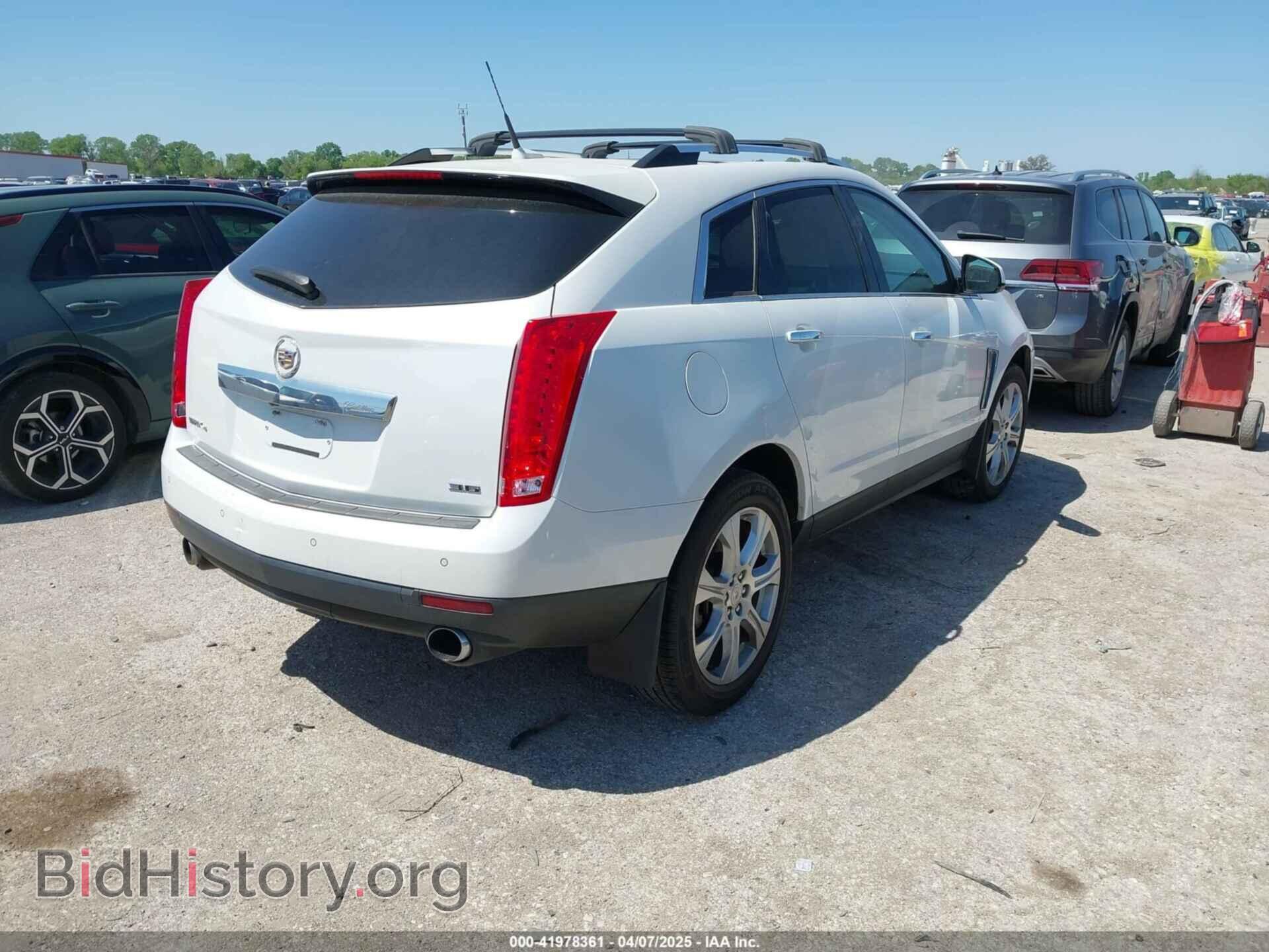 2014 CADILLAC SRX - VIN: 3GYFNFE35ES582897 - Фото 4