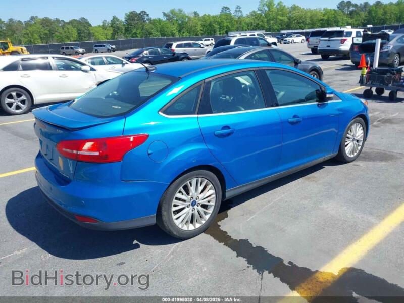 2015 Ford FOCUS (VIN 1FADP3J24FL322247) — photo 4 of 11