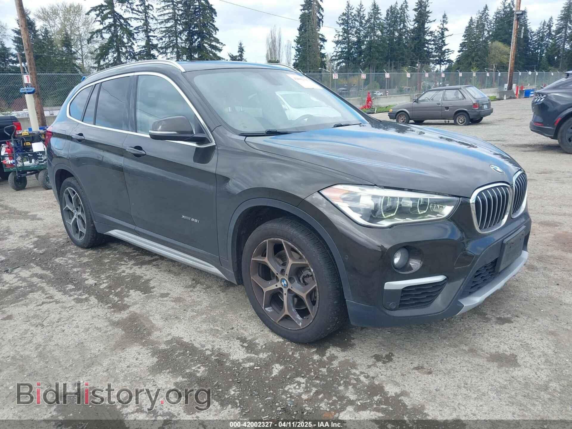 Фотография WBXHT3C32G5E53511 - BMW X1 2016