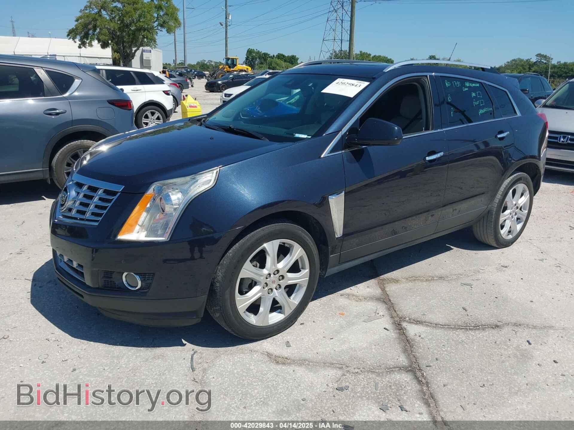 2014 CADILLAC SRX - VIN: 3GYFNCE37ES614151 - Фото 2