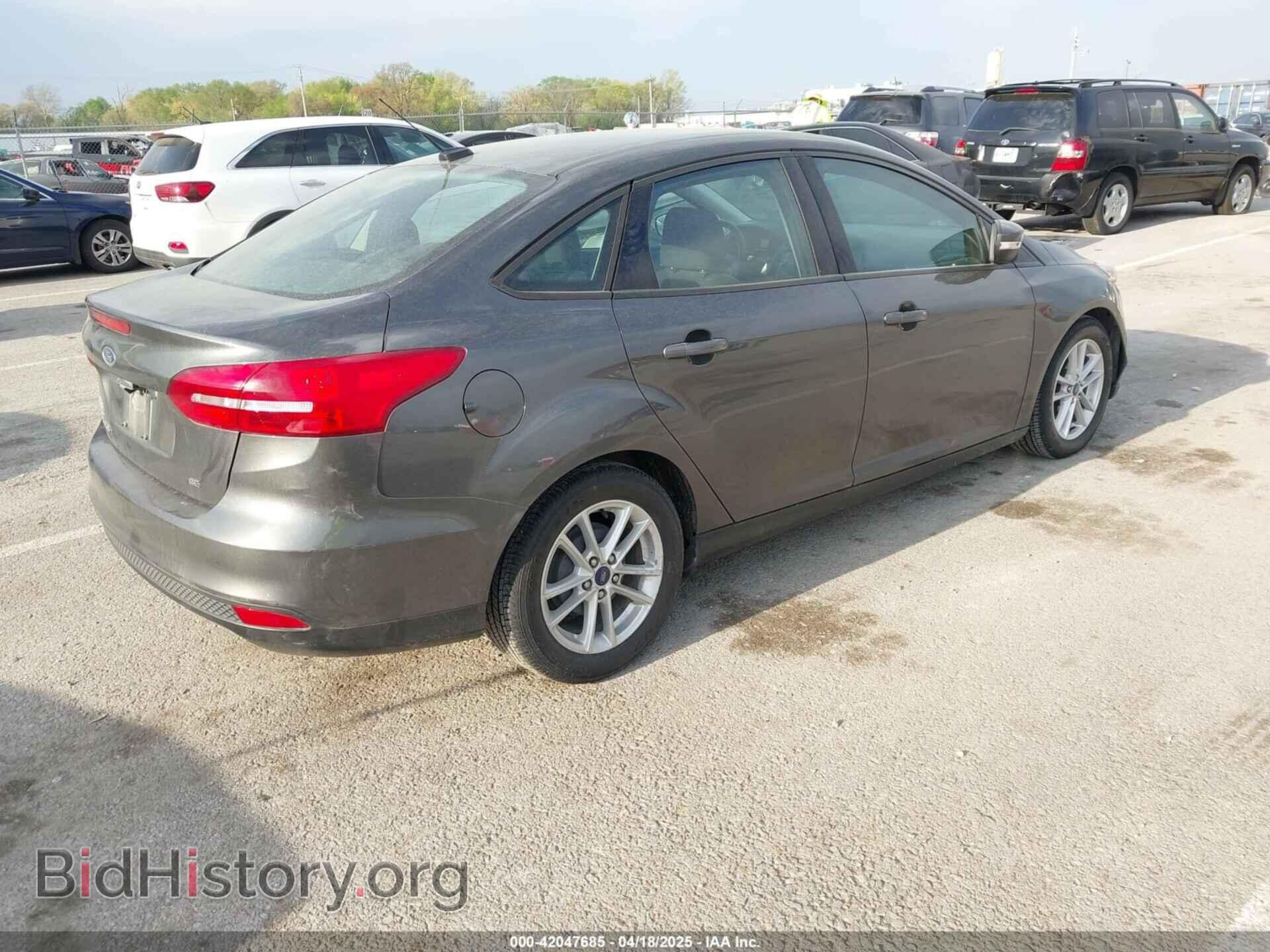 2017 FORD FOCUS - VIN: 1FADP3F21HL228709 - Photo 4