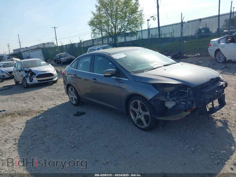 2014 Ford FOCUS Titanium (VIN 1FADP3J24EL241067) — photo 1 of 17, IAAI, damage: front end