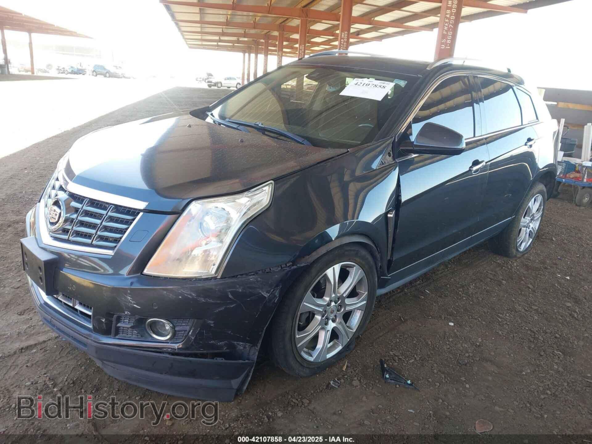 2014 CADILLAC SRX - VIN: 3GYFNDE31ES653114 - Фото 2