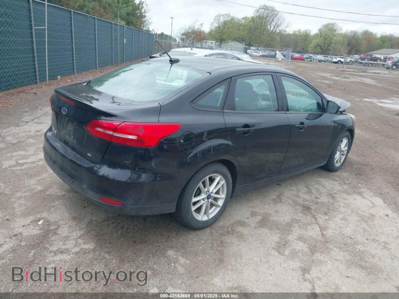 2017 Ford FOCUS (VIN 1FADP3F25HL239809) — photo 4 of 17