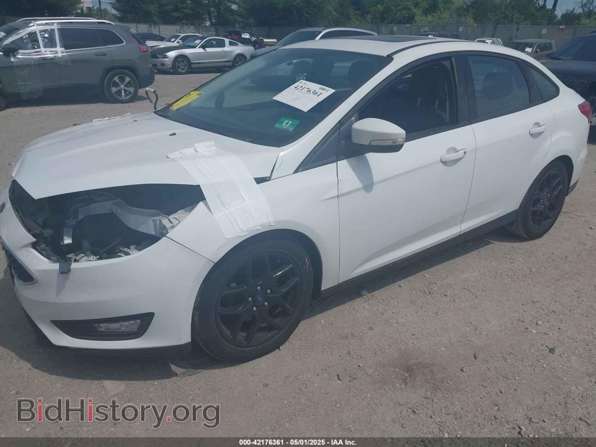 2016 FORD FOCUS - VIN: 1FADP3F22GL329904 - Фото 2