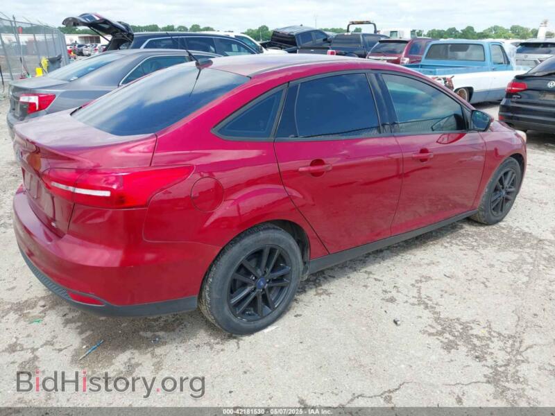 2017 Ford FOCUS (VIN 1FADP3F23HL313857) — photo 4 of 11