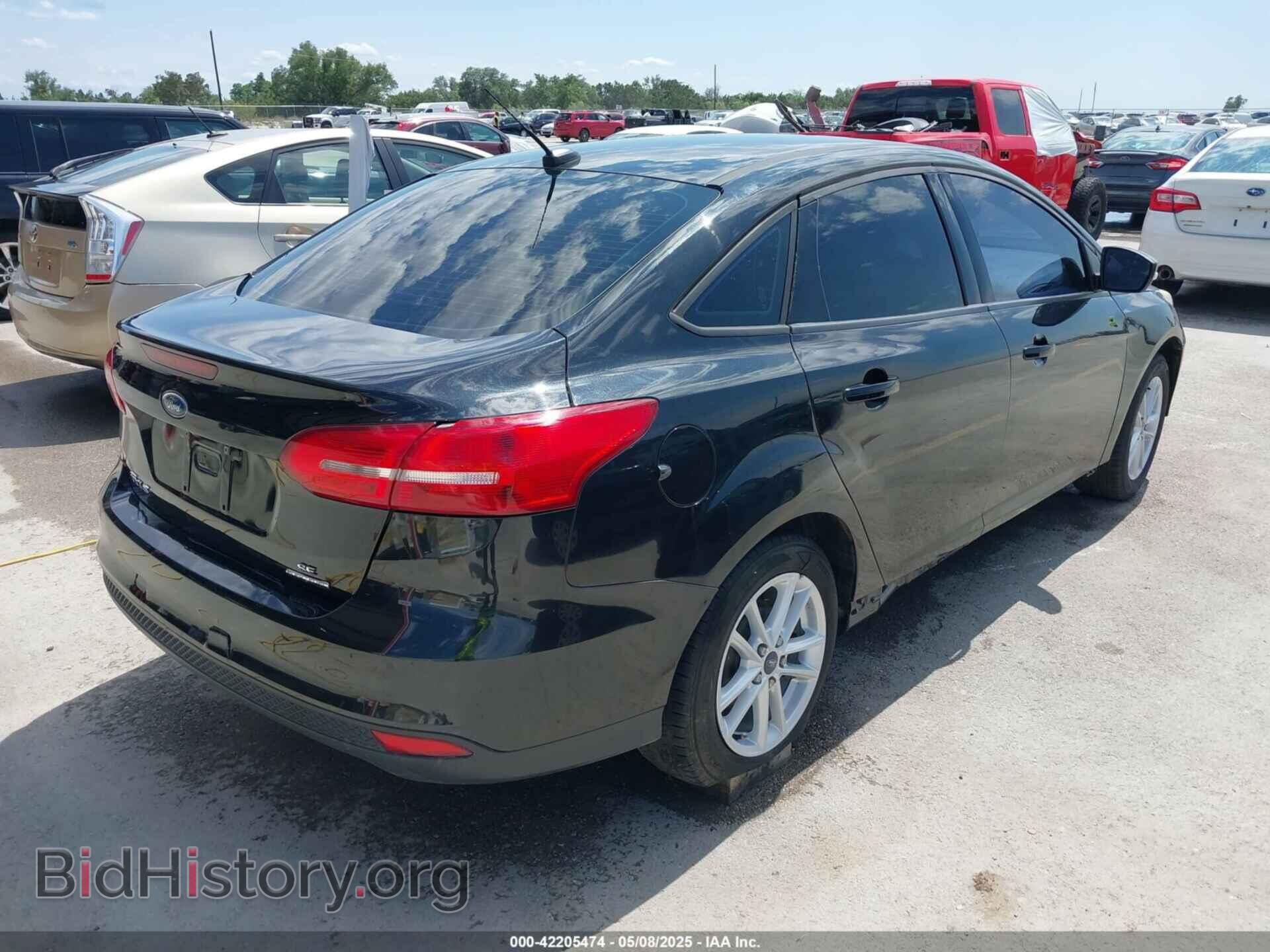 2015 FORD FOCUS - VIN: 1FADP3F2XFL313657 - Photo 4