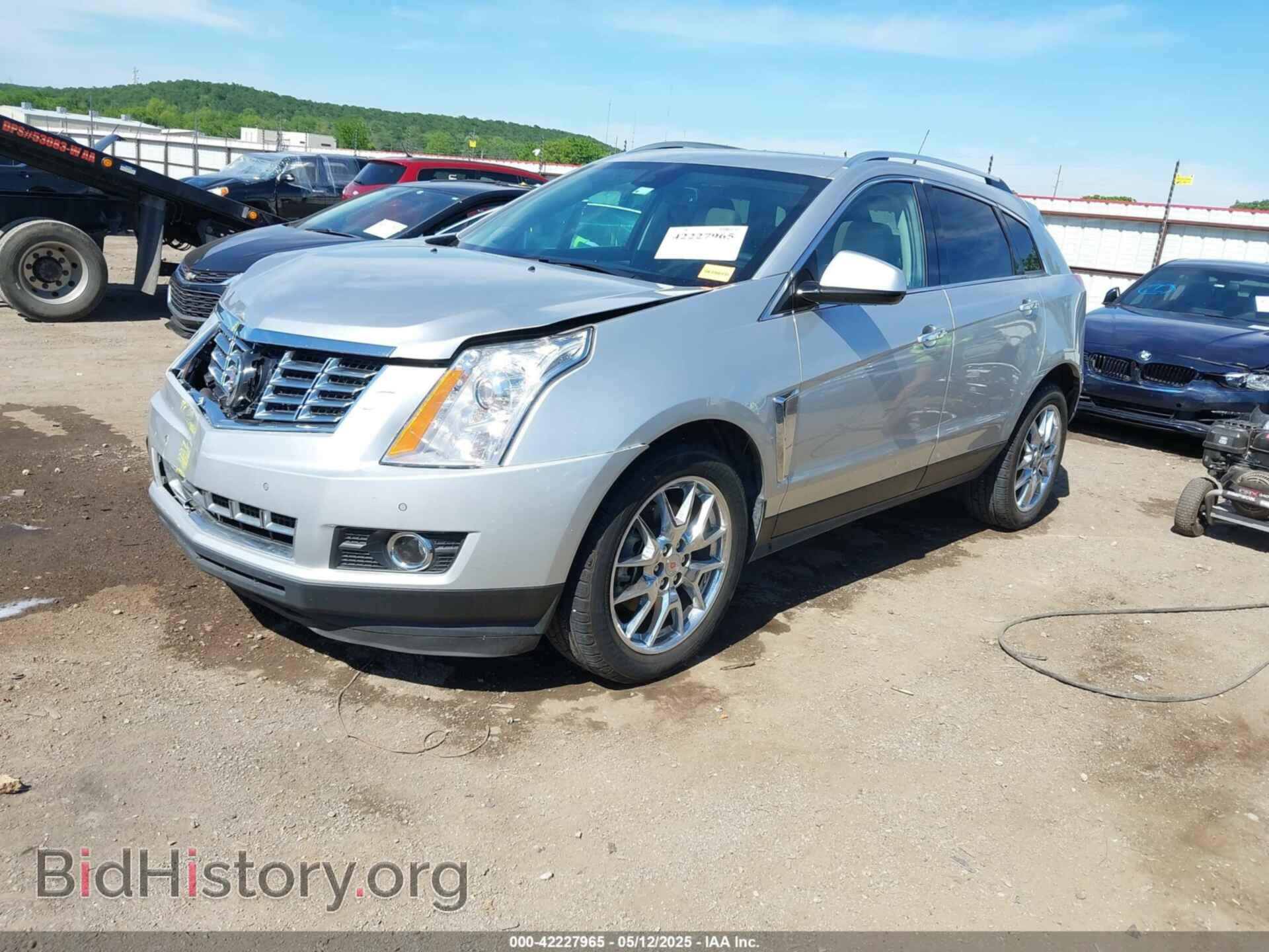 2014 CADILLAC SRX - VIN: 3GYFNDE34ES609432 - Фото 2
