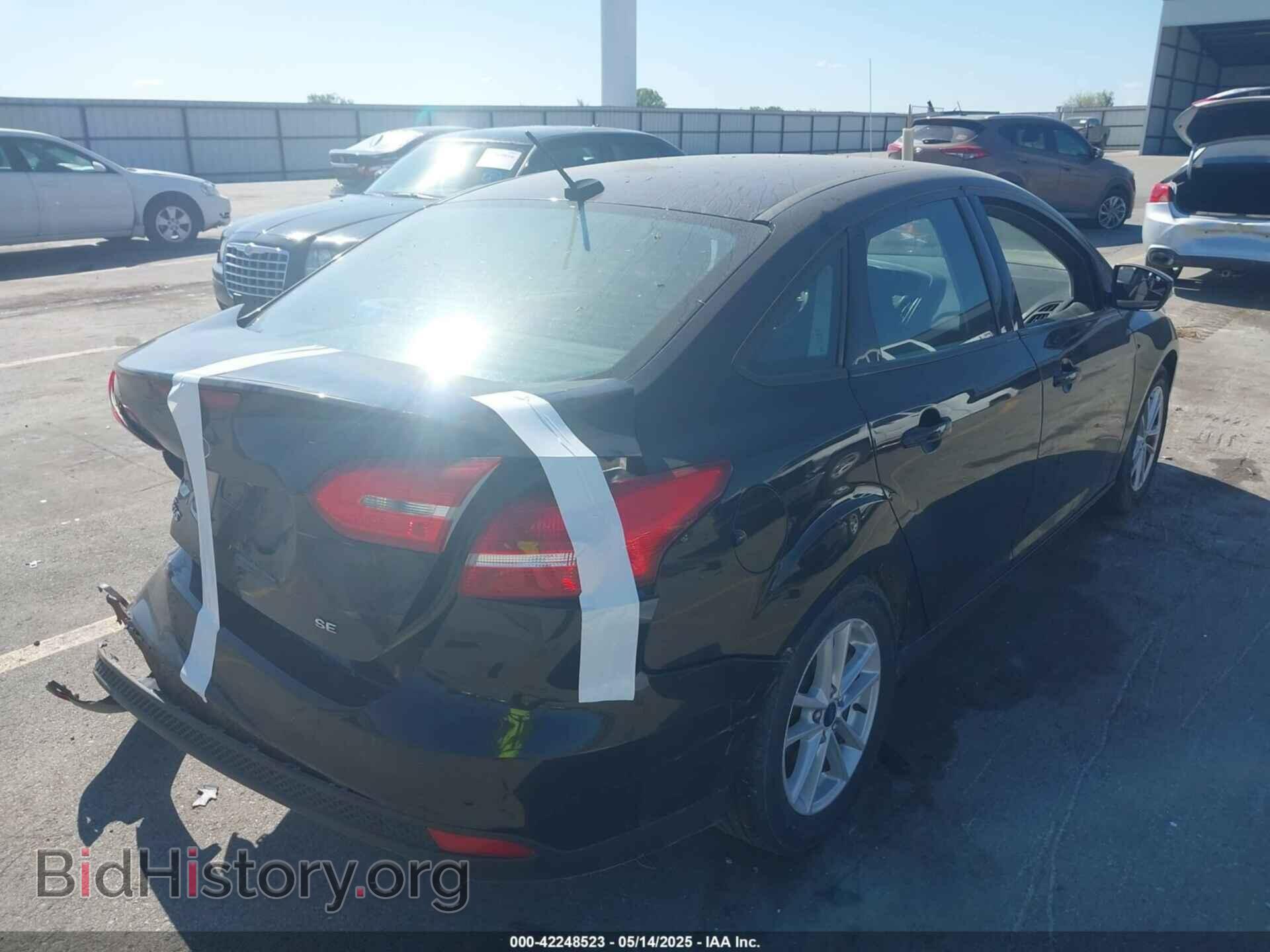 2017 FORD FOCUS - VIN: 1FADP3F28HL216766 - Photo 4