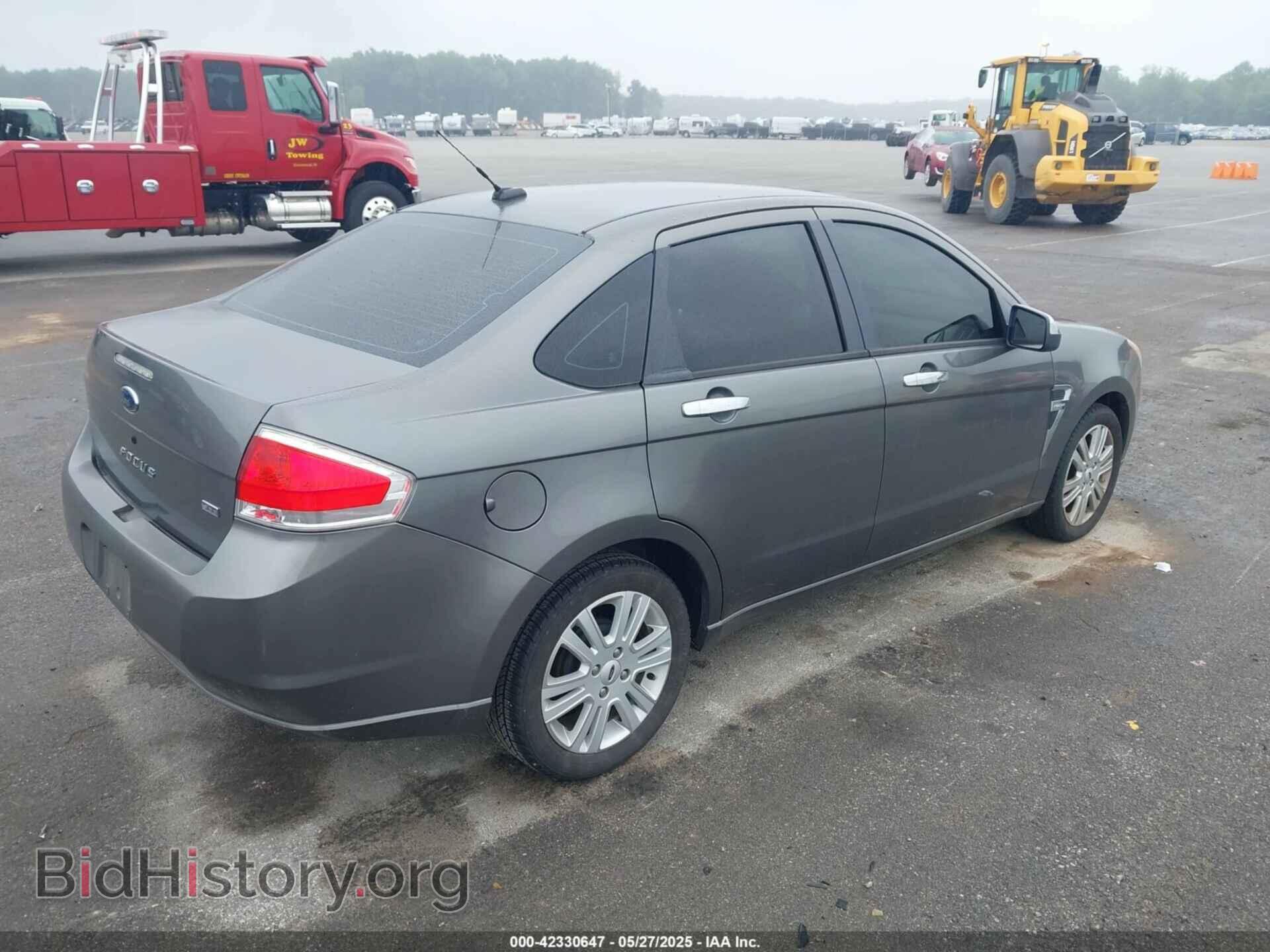 2009 FORD FOCUS - VIN: 1FAHP37N79W231740 - Photo 4