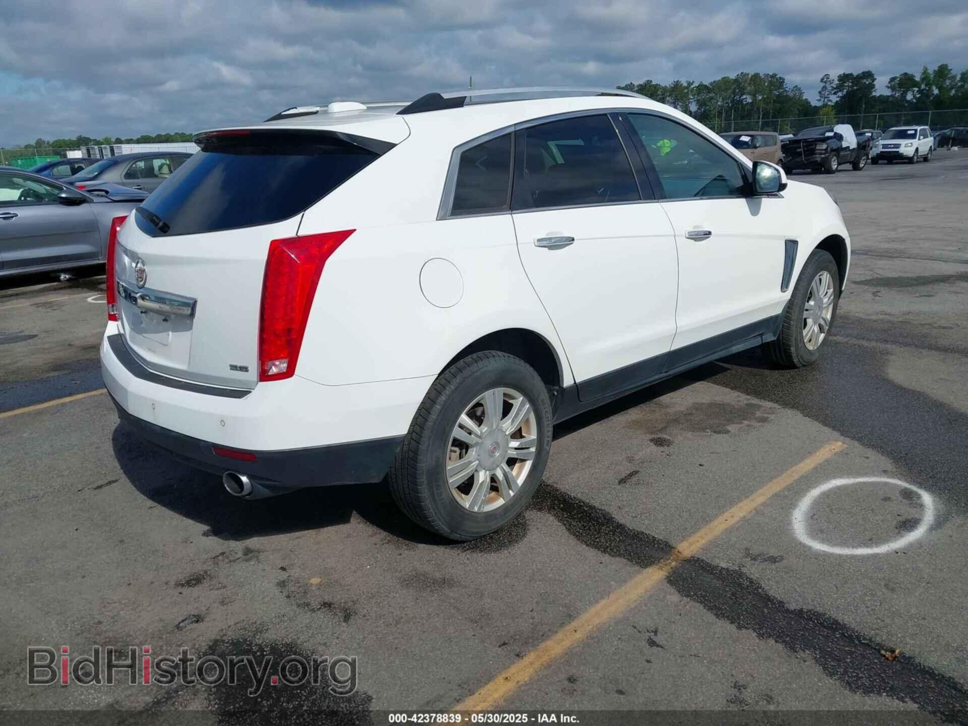 2016 CADILLAC SRX - VIN: 3GYFNBE33GS526517 - Фото 4