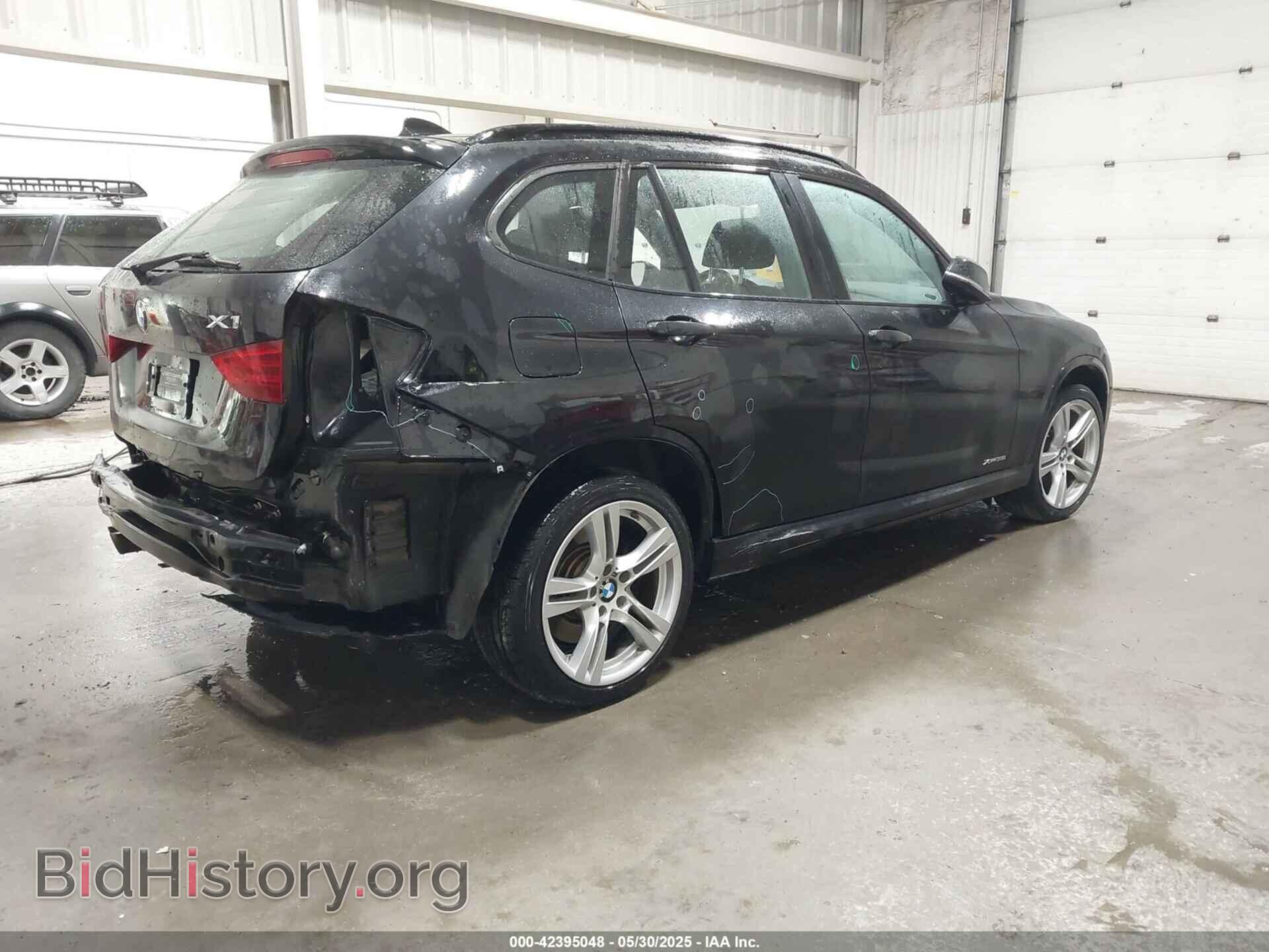 2014 BMW X1 - VIN: WBAVM5C58EVV93385 - Фото 4