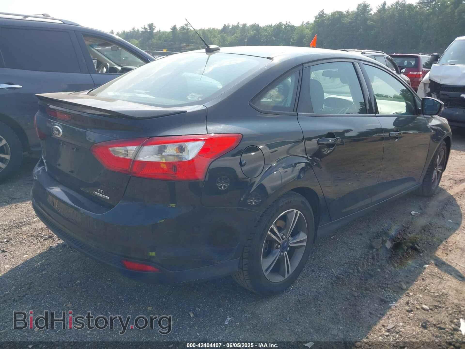 2014 FORD FOCUS - VIN: 1FADP3F28EL424285 - Photo 4
