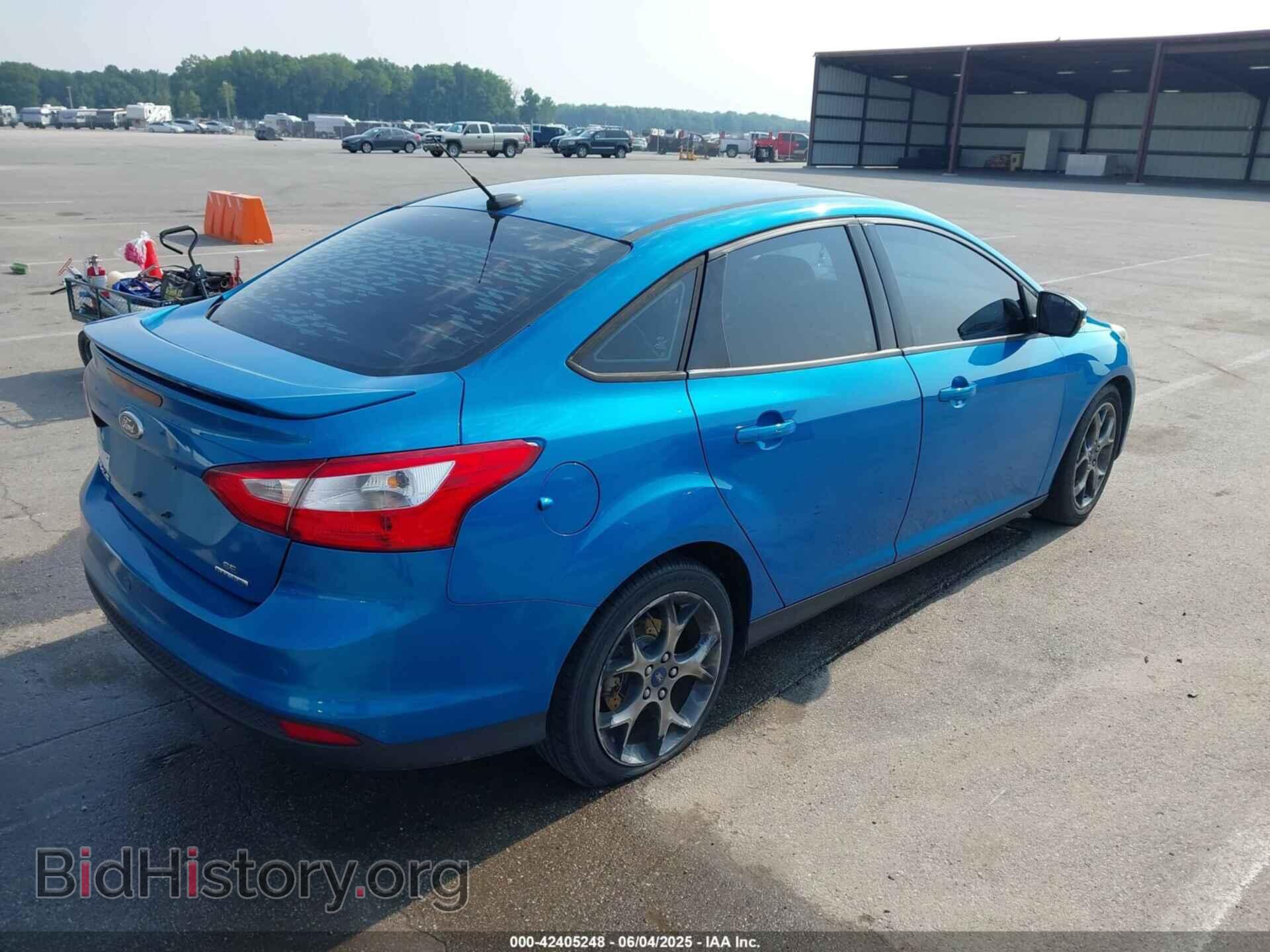 2014 FORD FOCUS - VIN: 1FADP3F29EL411979 - Photo 4