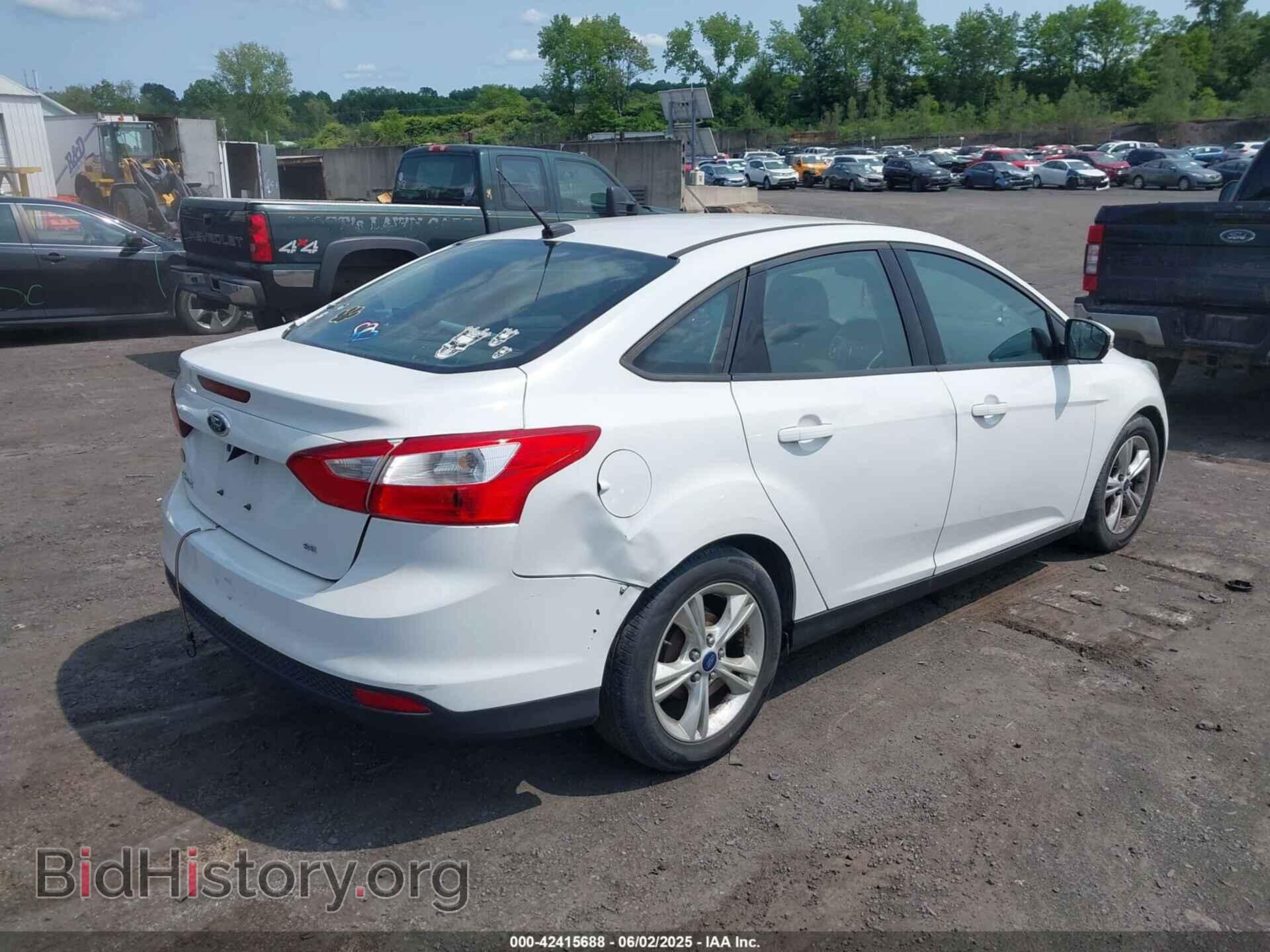 2014 FORD FOCUS - VIN: 1FADP3F21EL402449 - Photo 4