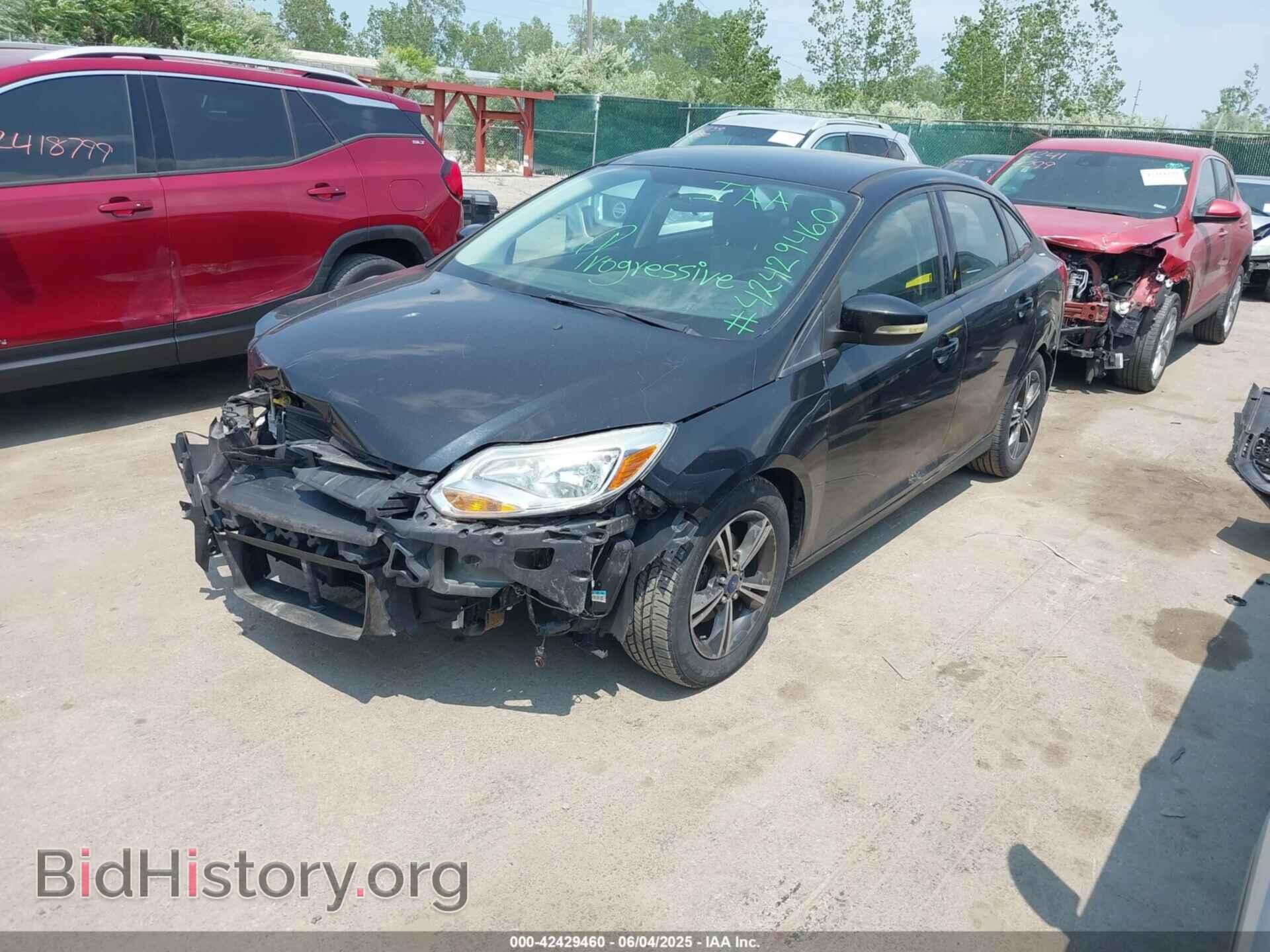 2014 FORD FOCUS - VIN: 1FADP3F29EL371550 - Photo 2