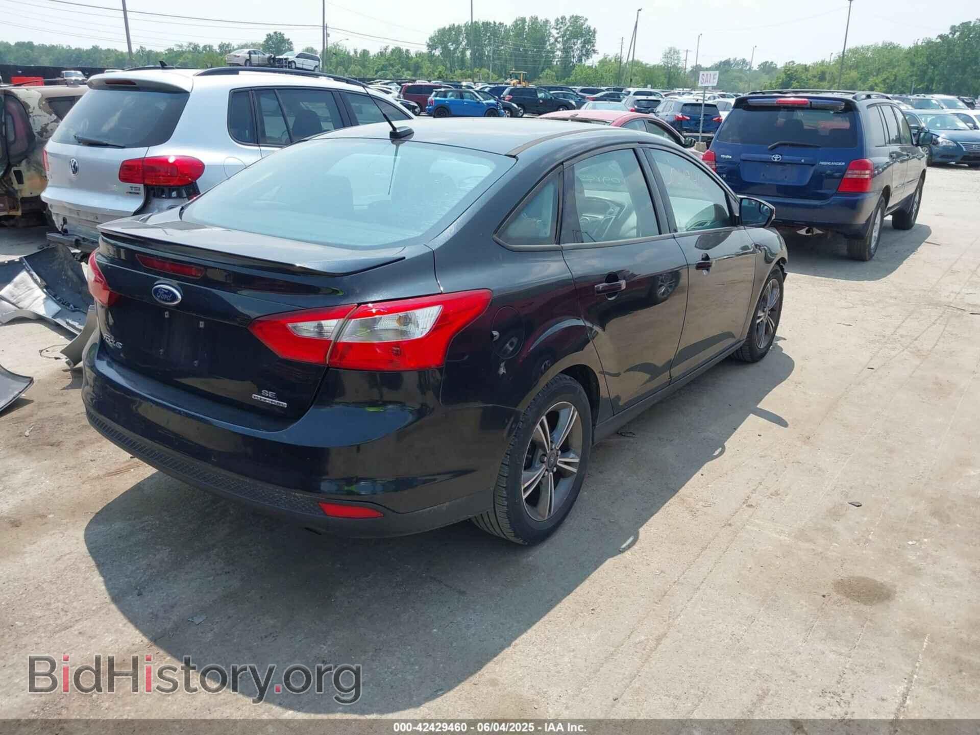 2014 FORD FOCUS - VIN: 1FADP3F29EL371550 - Photo 4