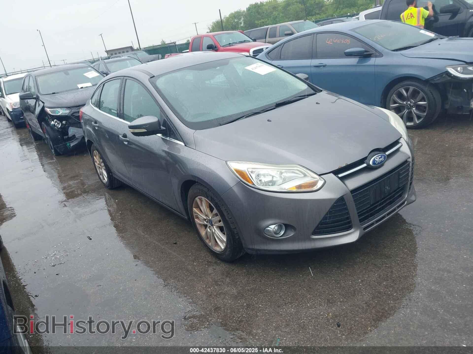 Фотография 1FAHP3H24CL142091 - FORD FOCUS 2012