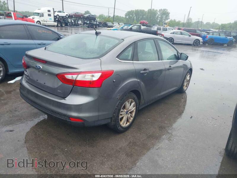 2012 Ford FOCUS (VIN 1FAHP3H24CL142091) — фото 4 из 11