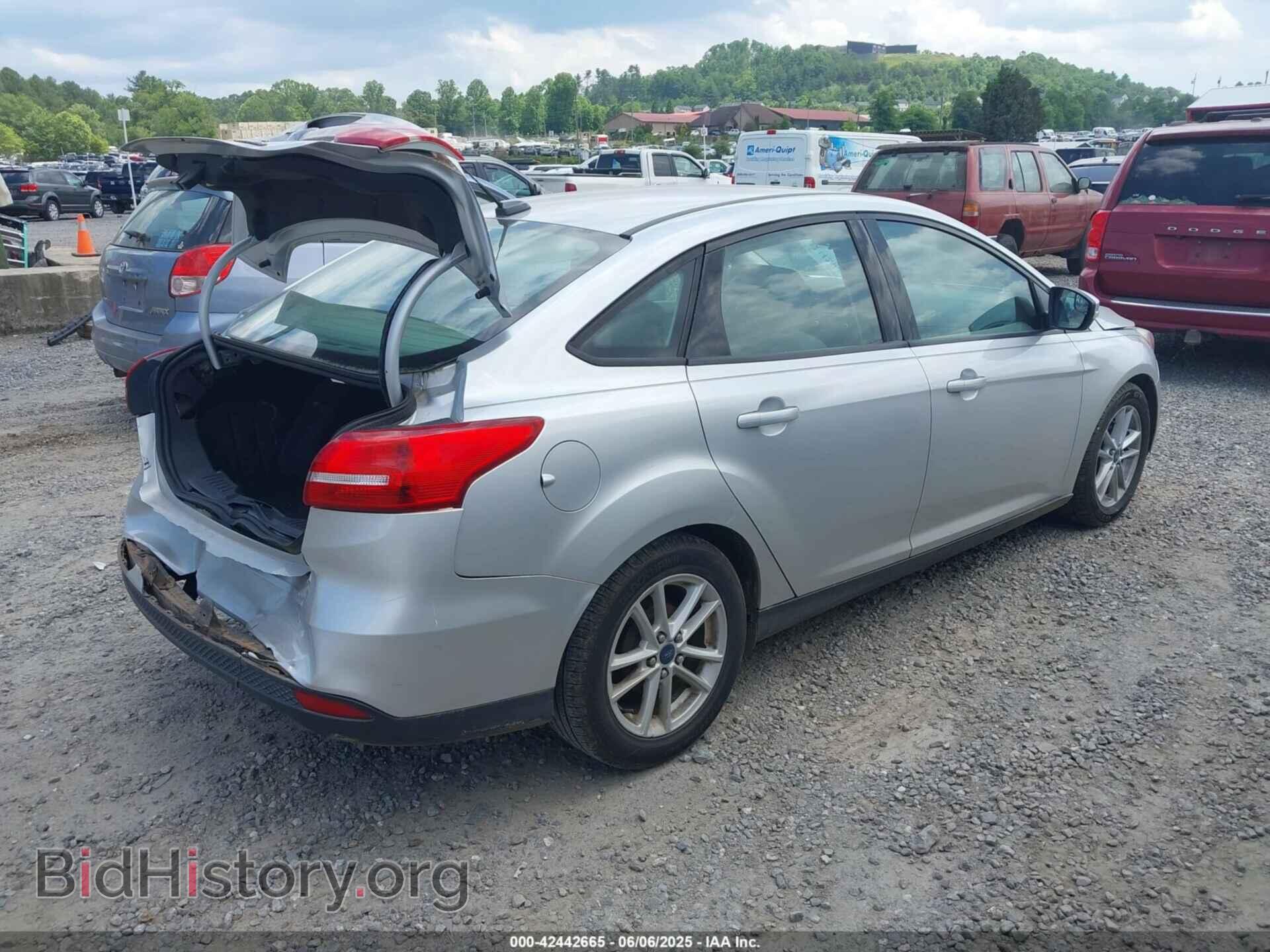 2015 FORD FOCUS - VIN: 1FADP3F20FL372555 - Photo 4
