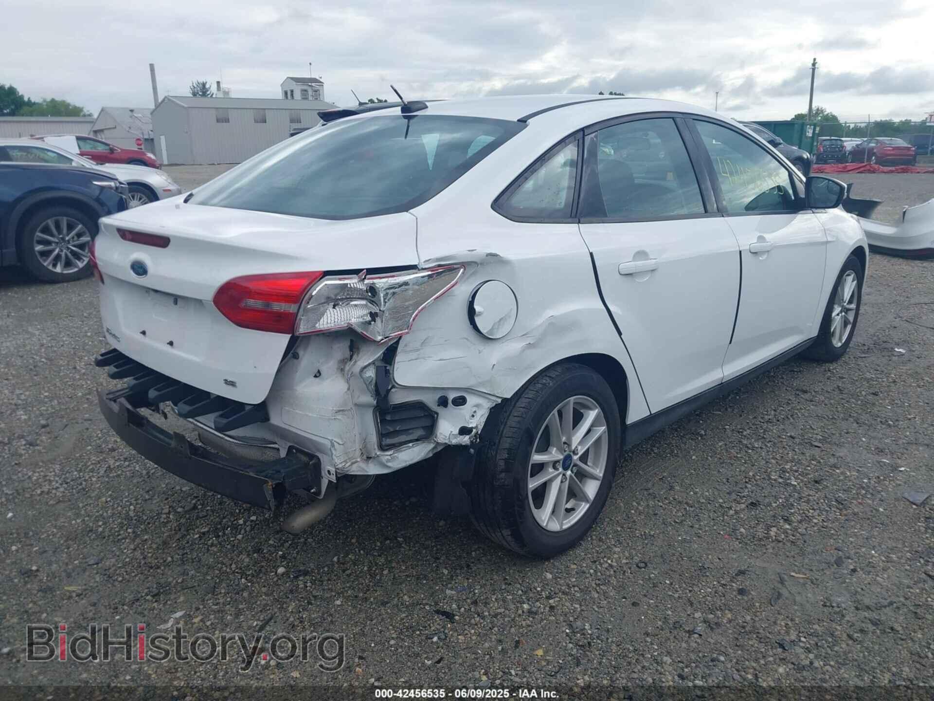 2017 FORD FOCUS - VIN: 1FADP3F21HL322671 - Фото 4