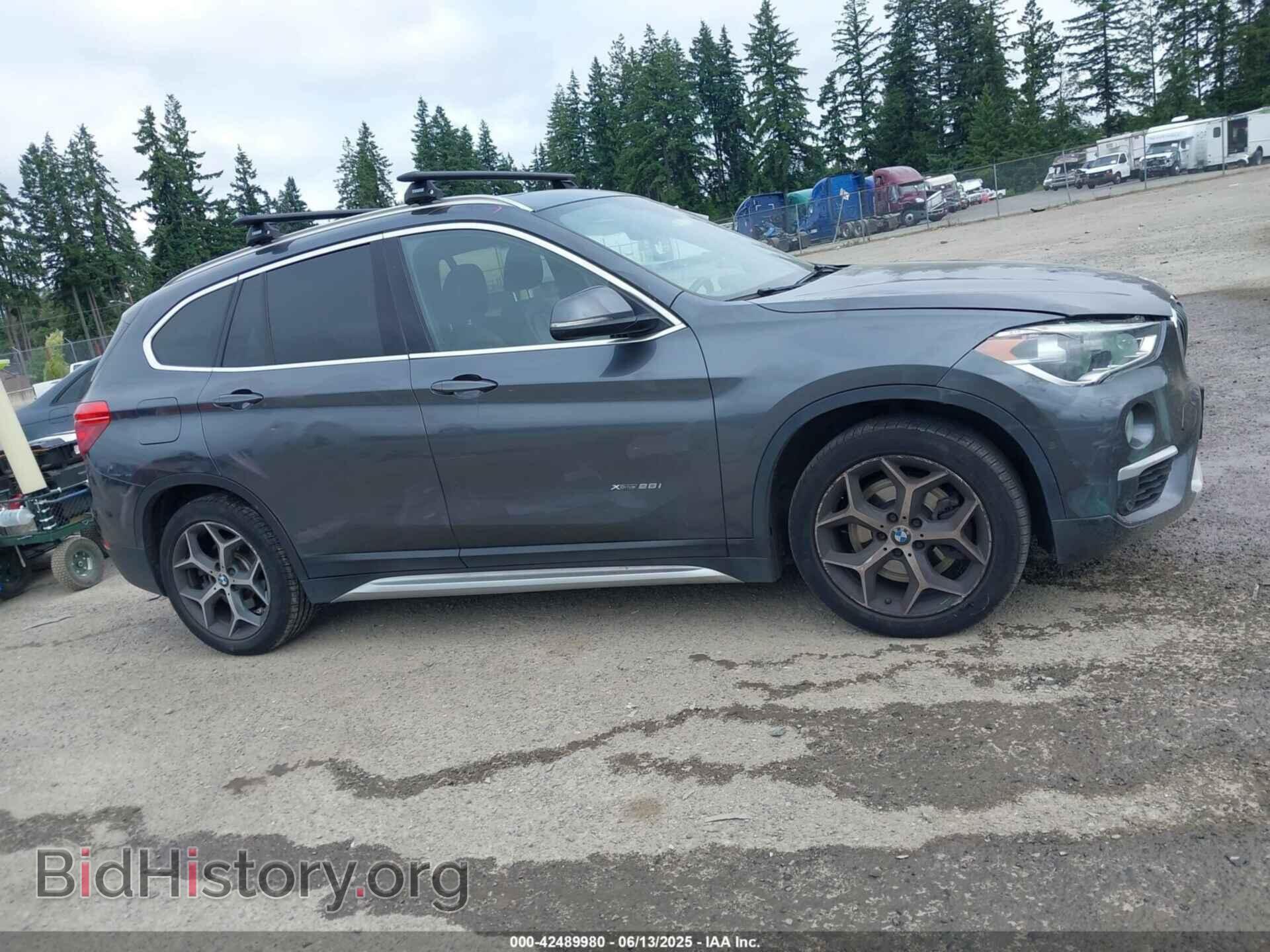 2017 BMW X1 - VIN: WBXHT3C39H5F73601 - Фото 13